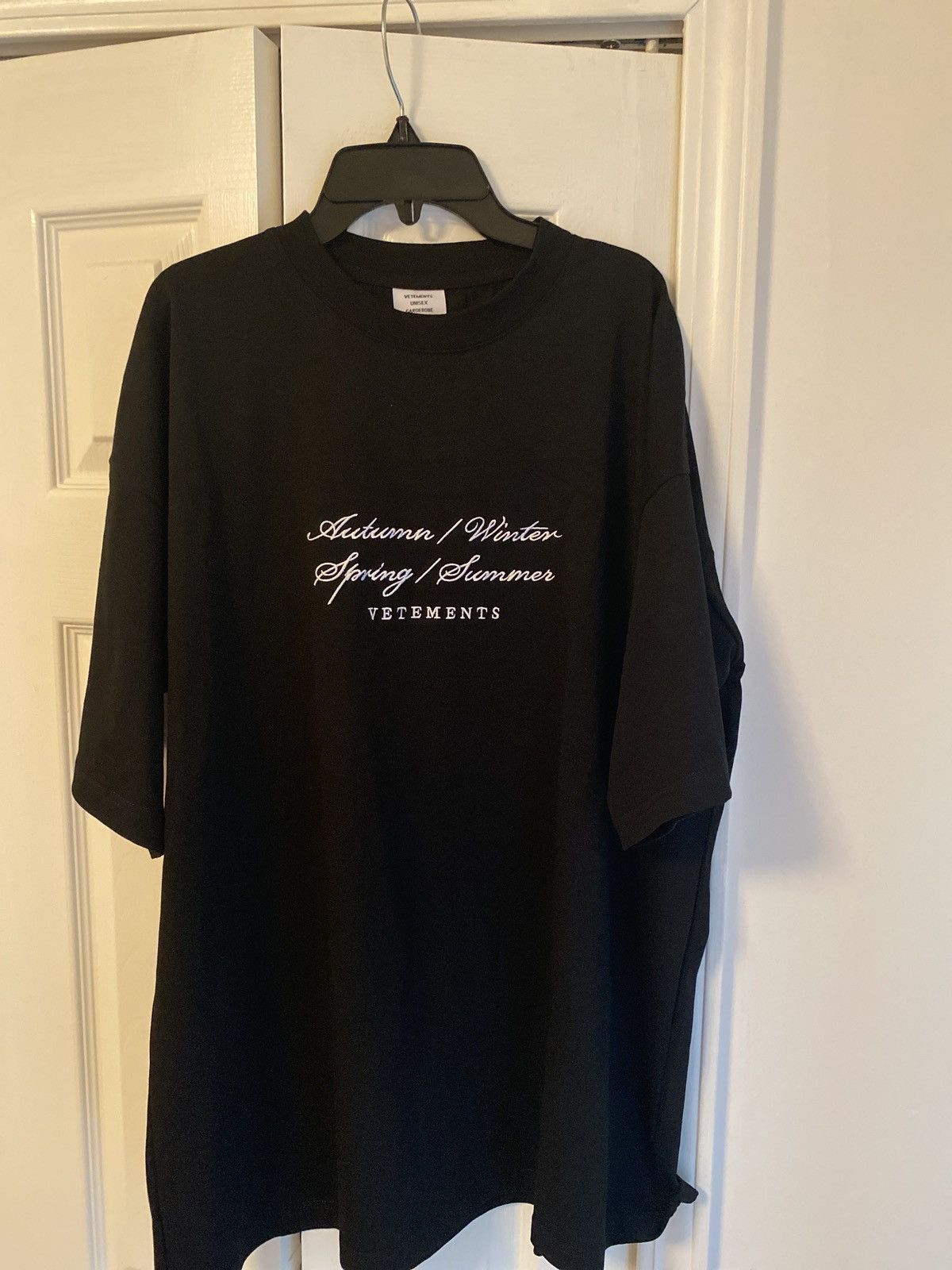 Designer VETEMENTS Black 'Autumn/Winter/Spring/Summer' T-Shirt | Grailed