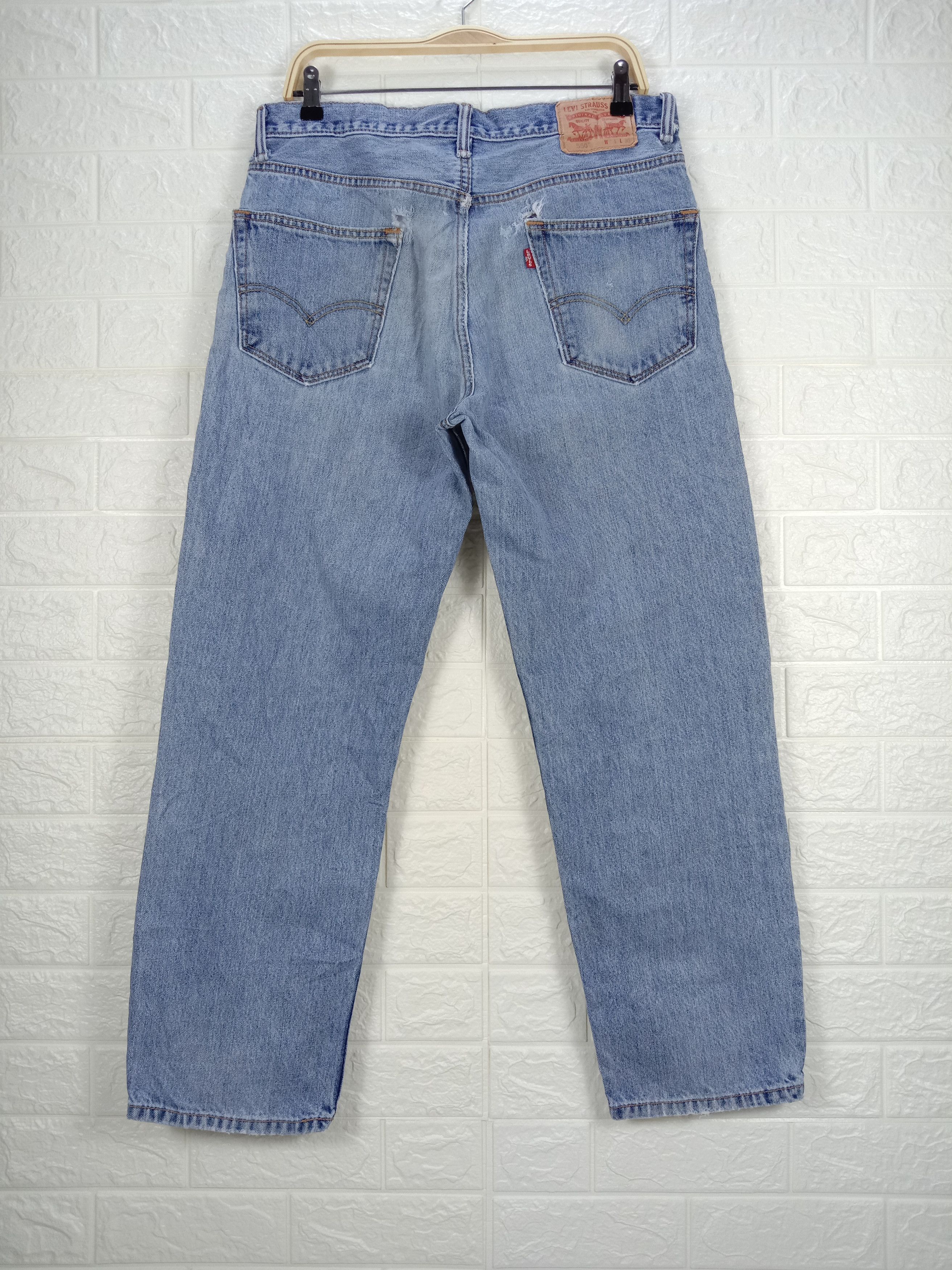 Levi's Vintage Levi's 550 Jeans Light Wash Distressed Denim Size US 32 / EU 48 - 5 Thumbnail