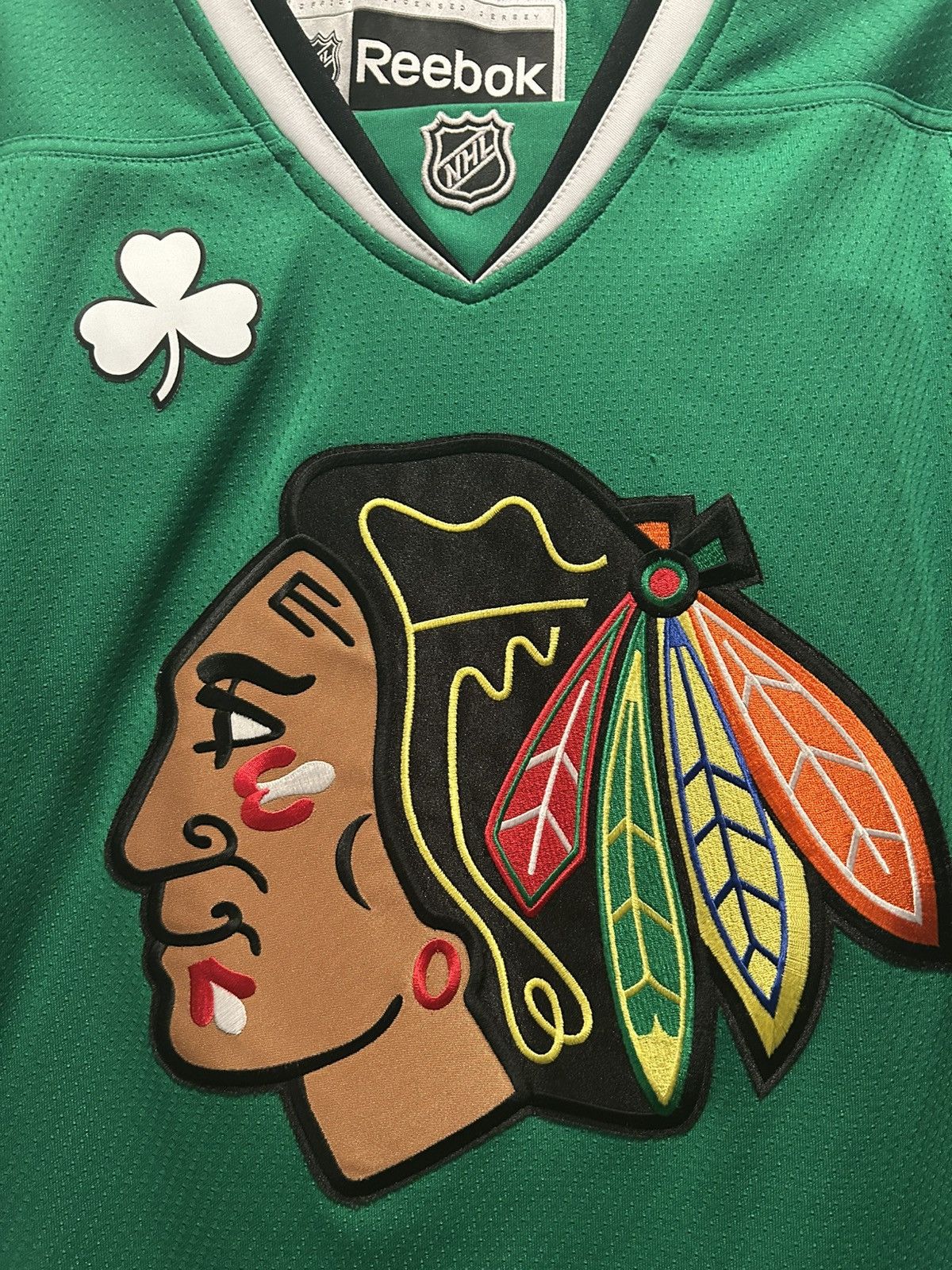 Chicago blackhawks green jersey history on sale