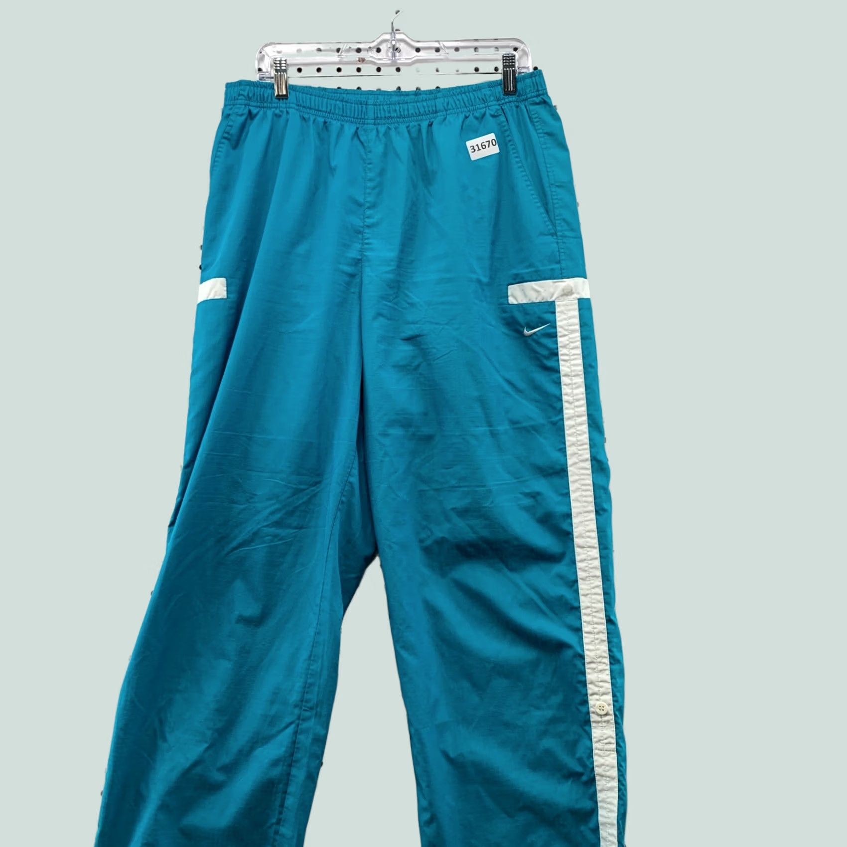 Nike Vintage Nike Pants Womens XL Teal Swoosh Windbreaker Fits 31x32 Size 40" / US 18 - 1 Thumbnail