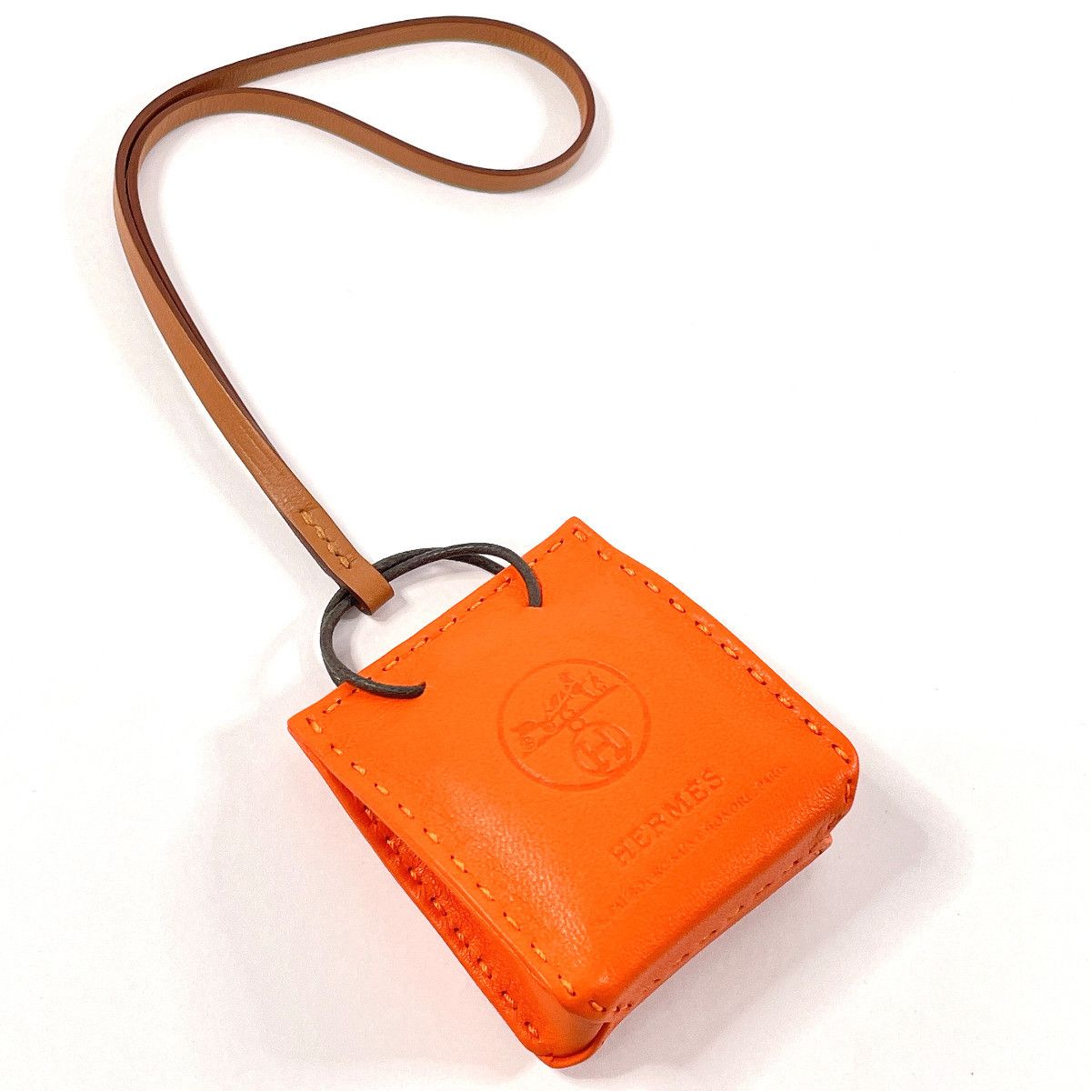 image of Hermes Milo Shopping Bag Charm Key Chain Leather In in Orange, Women's