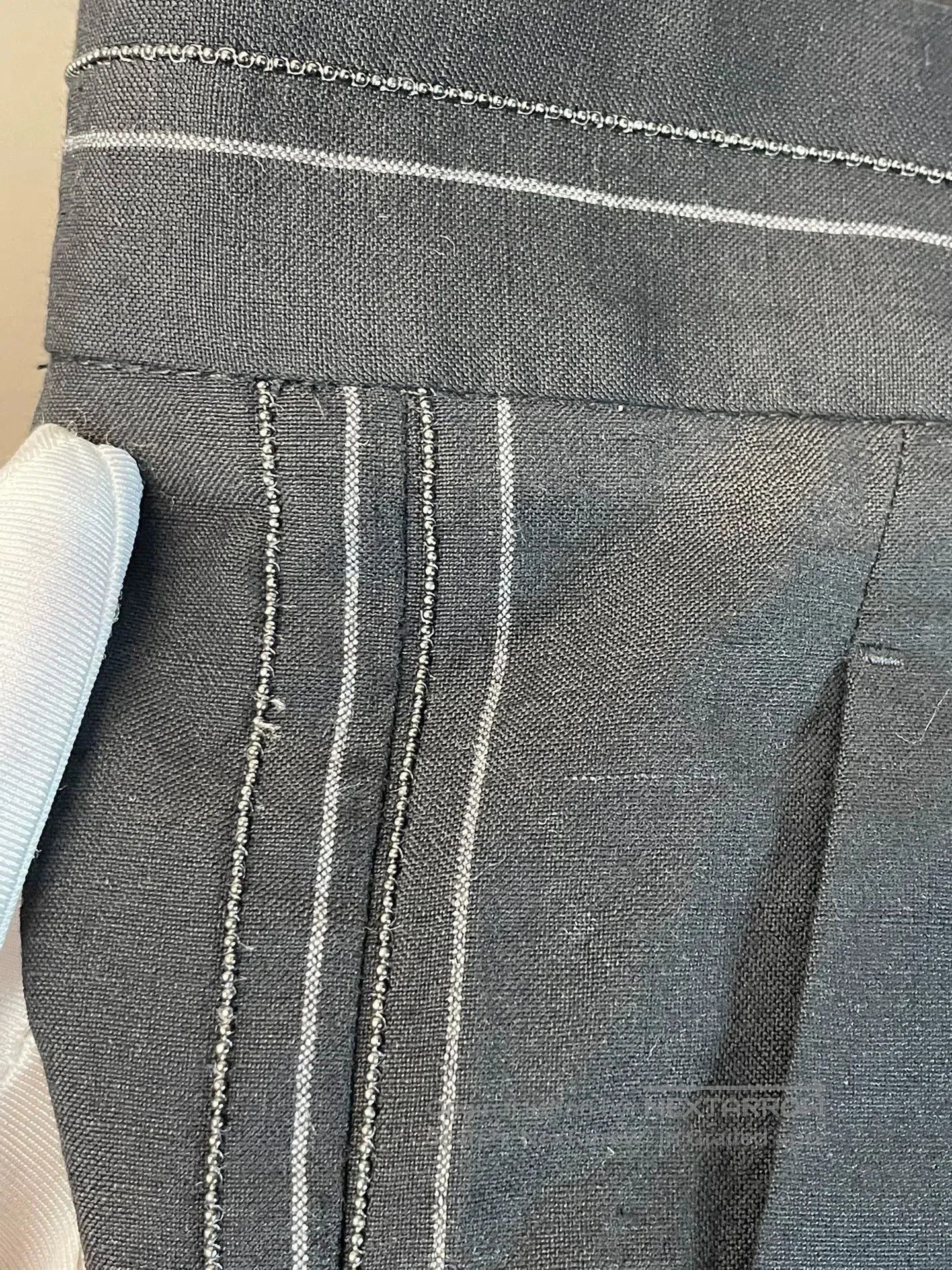 brunello cucinelli black sequin wool trousers.
