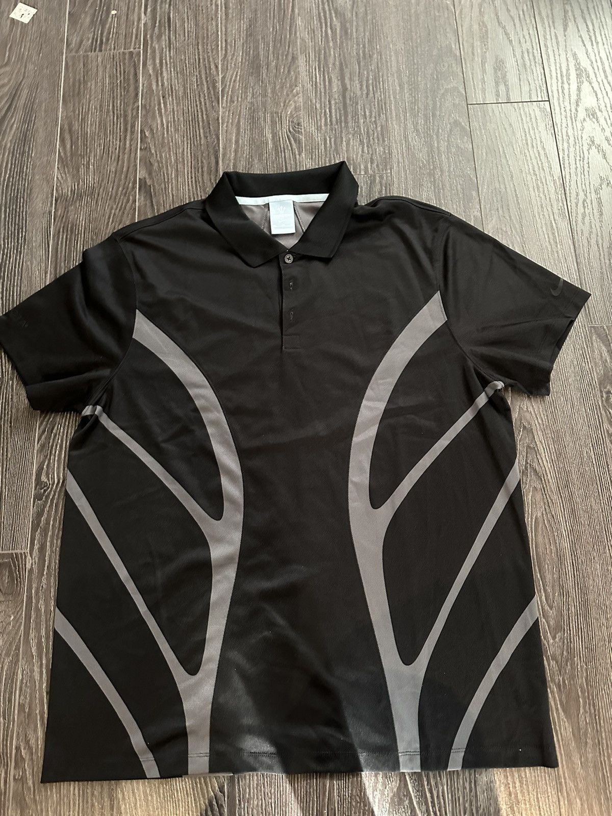 image of Nike Nocta Golf Shirt in Black, Men's (Size XL)