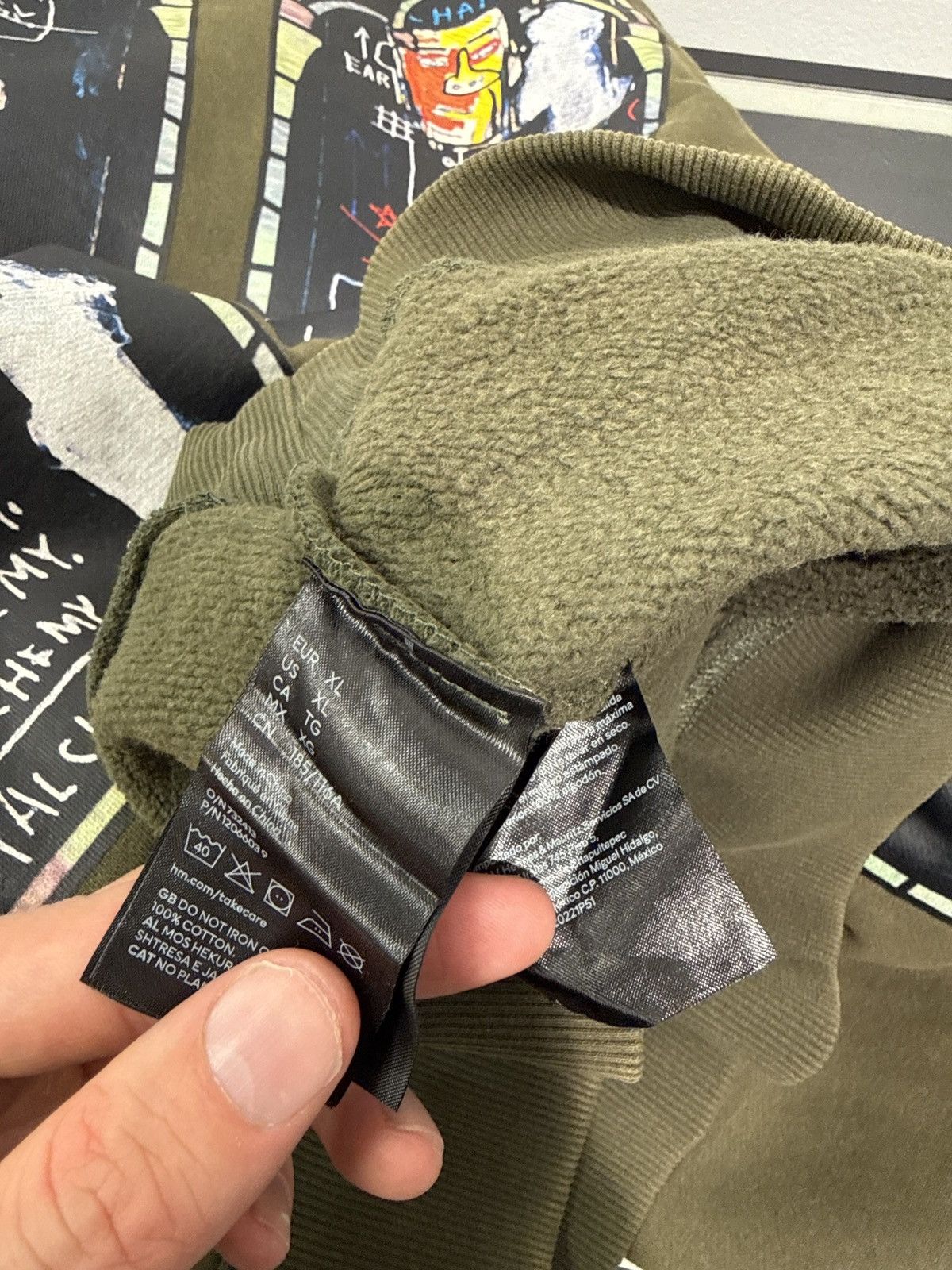 H&M × Jean-Michel Basquiat × Who Decides War Who Decides War x H&M x Basquiat Hoodie Olive Size US XL / EU 56 / 4 - 5 Thumbnail