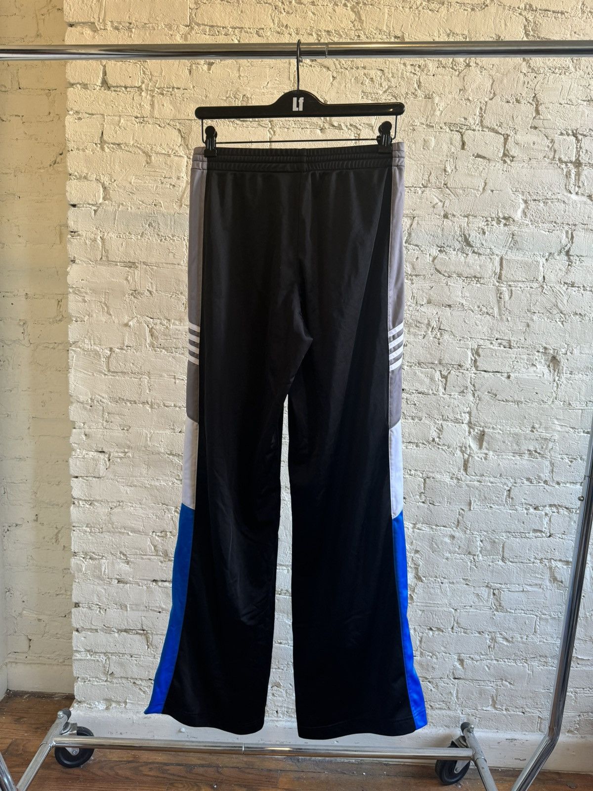 Martine Rose SS24 Martine Rose Flared Track Pants | Grailed