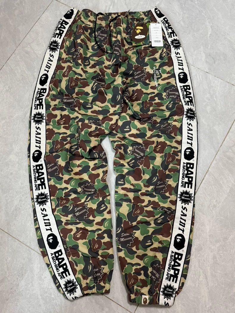 Bape SAINT Mxxxxxx x BAPE Camo Track Pants - dmc Size US 32 / EU 48 - 1 Thumbnail