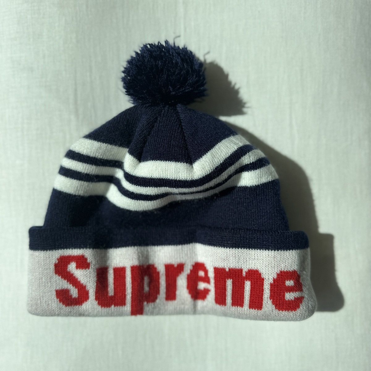 Supreme SUPREME NAVY STRIPE ACRYLIC POM BEANIE W RED LOGO Size ONE SIZE - 5 Thumbnail