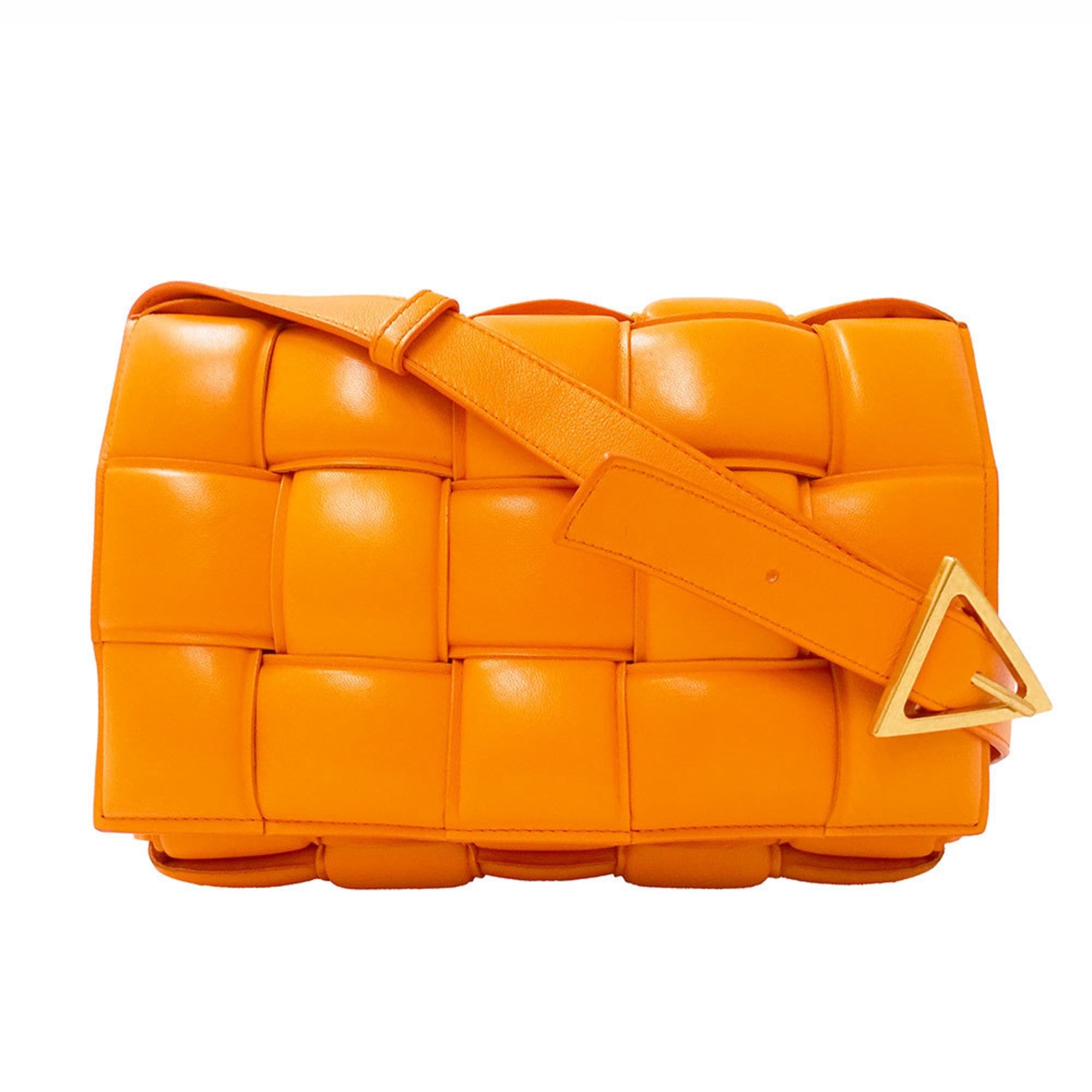 Bottega Veneta Bottega Veneta handbag for women, brand name Cassette shoulder bag, leather, orange, woven design. Size ONE SIZE - 1 Thumbnail