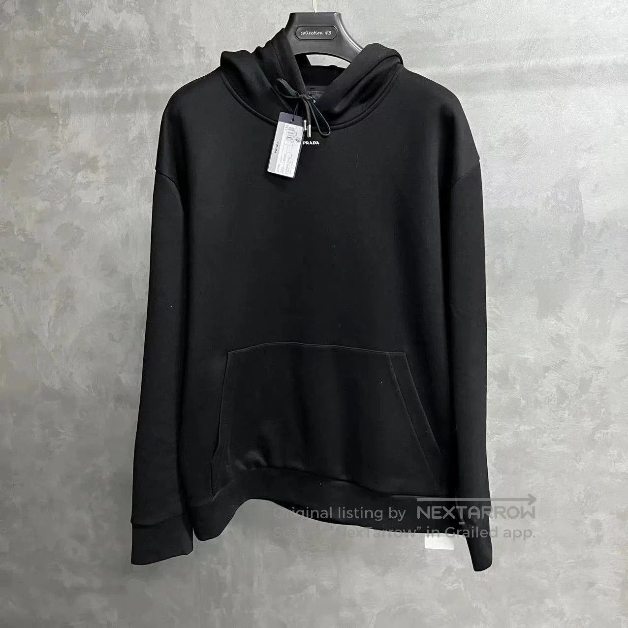 prada black oversized hooded sweatshirt with pockets.