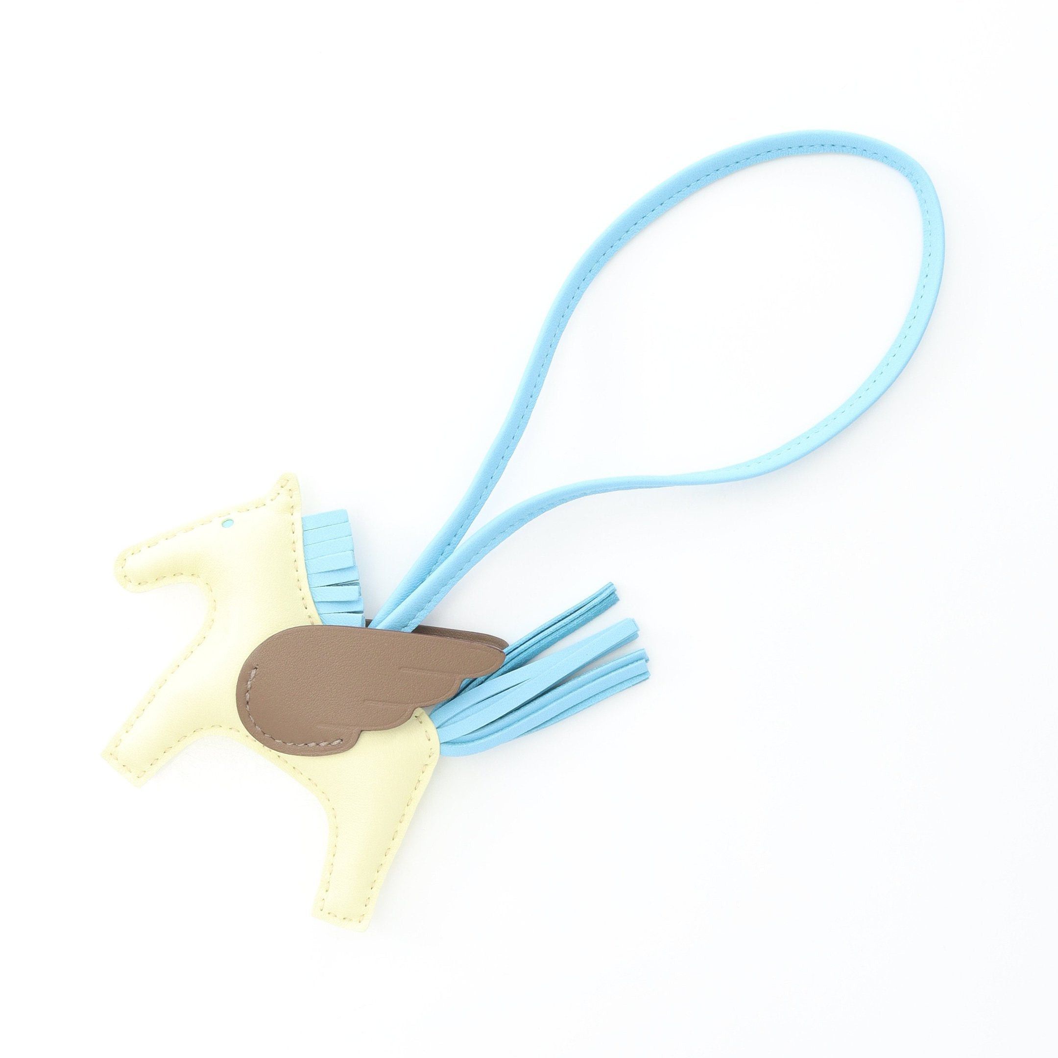 Hermes Hermes Rodeo Pegasus Pm Jaune Milton Celeste Etoupe Bag Charm Aagneau Veau Swift Light Yellow Blue Gray Brown Double Engraved Size ONE SIZE - 1 Thumbnail