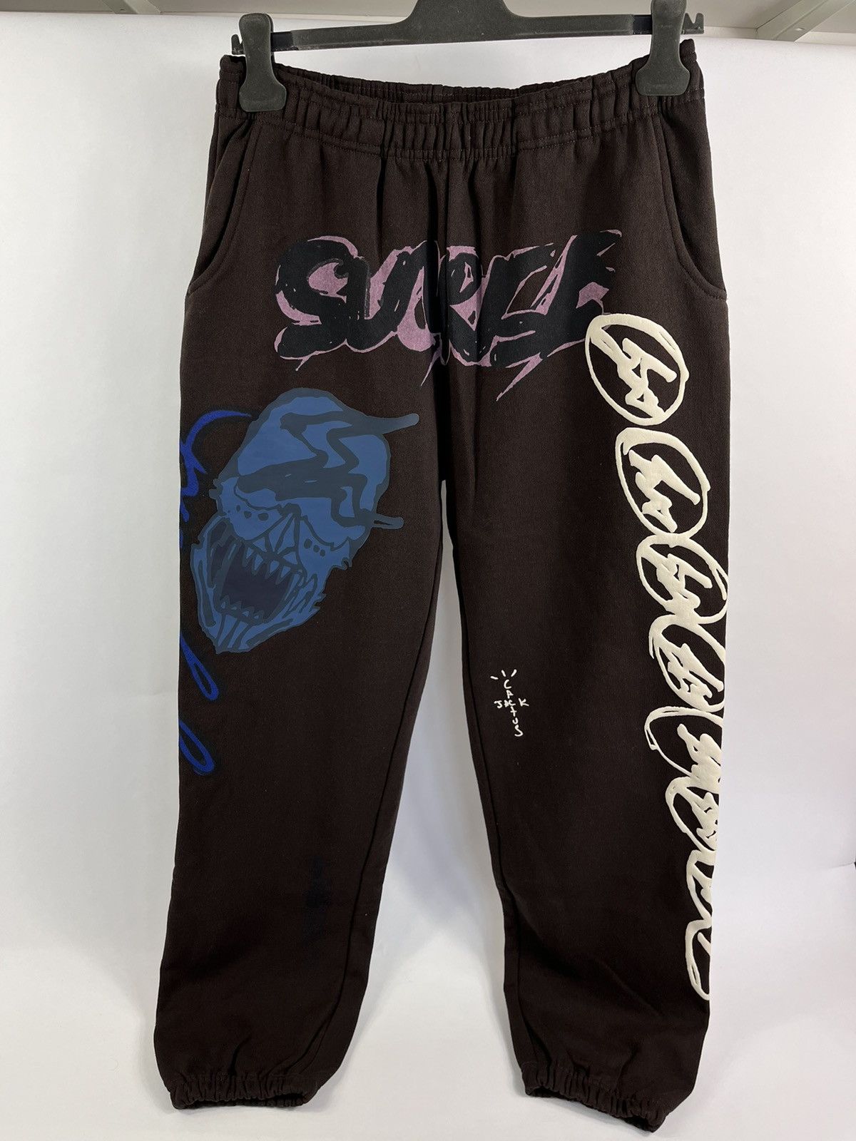 Travis Scott SCULL PRINT TRACK PANTS | Grailed