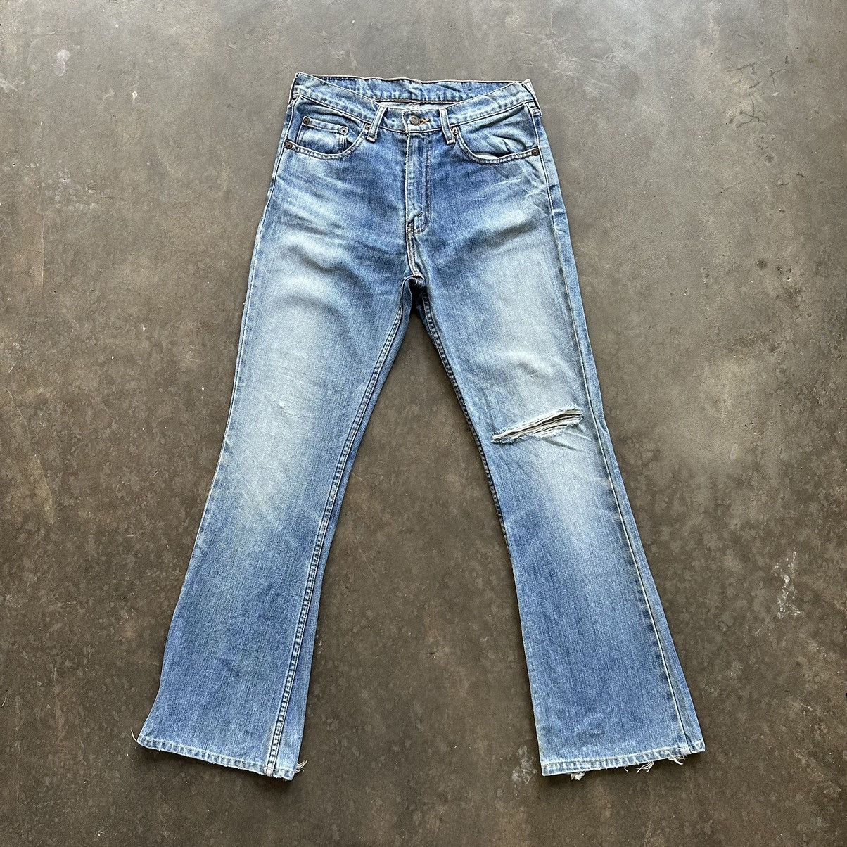 Vintage Levi’s 557 Distressed Flare Faded Denim Jean Pant