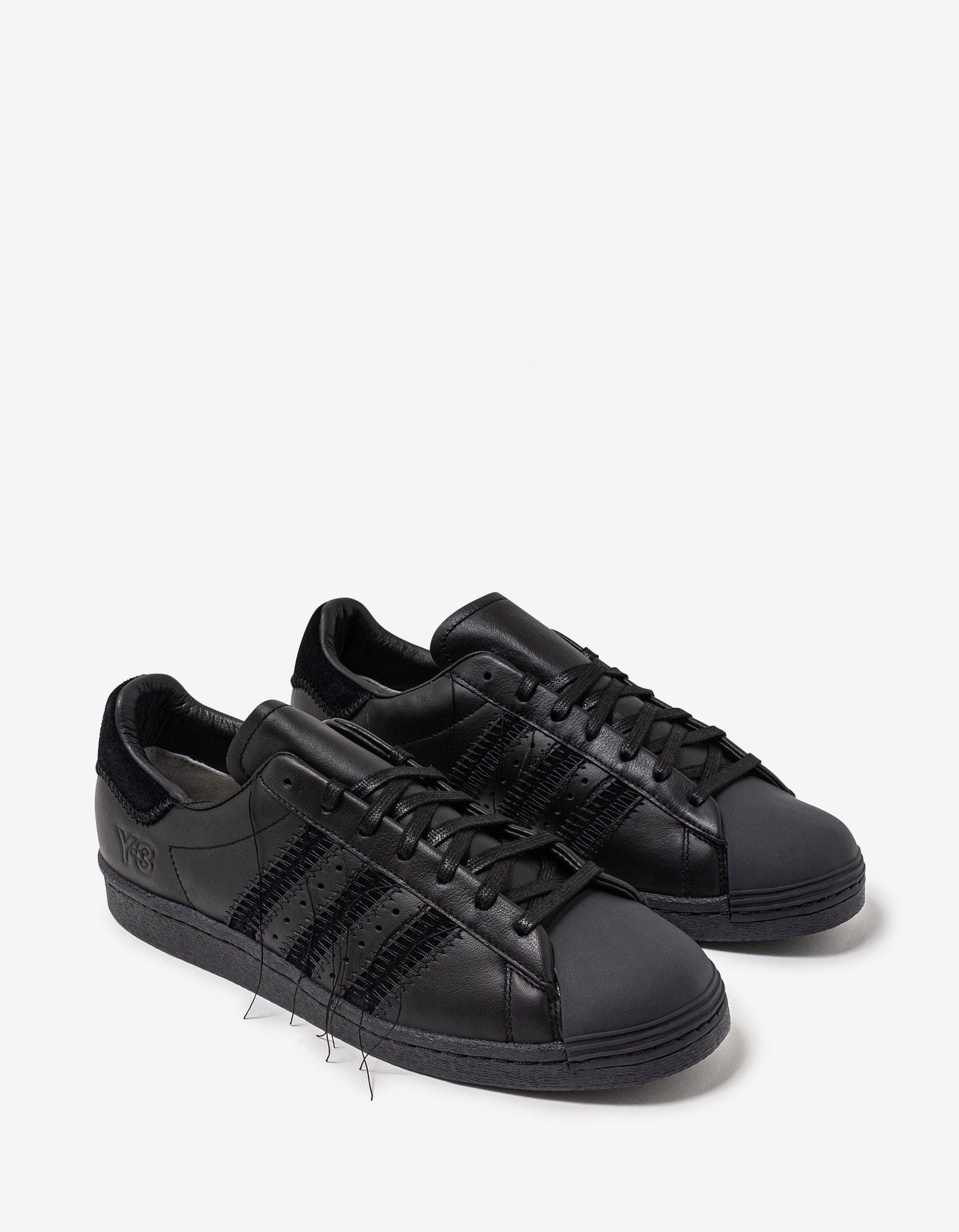 black superstar trainers