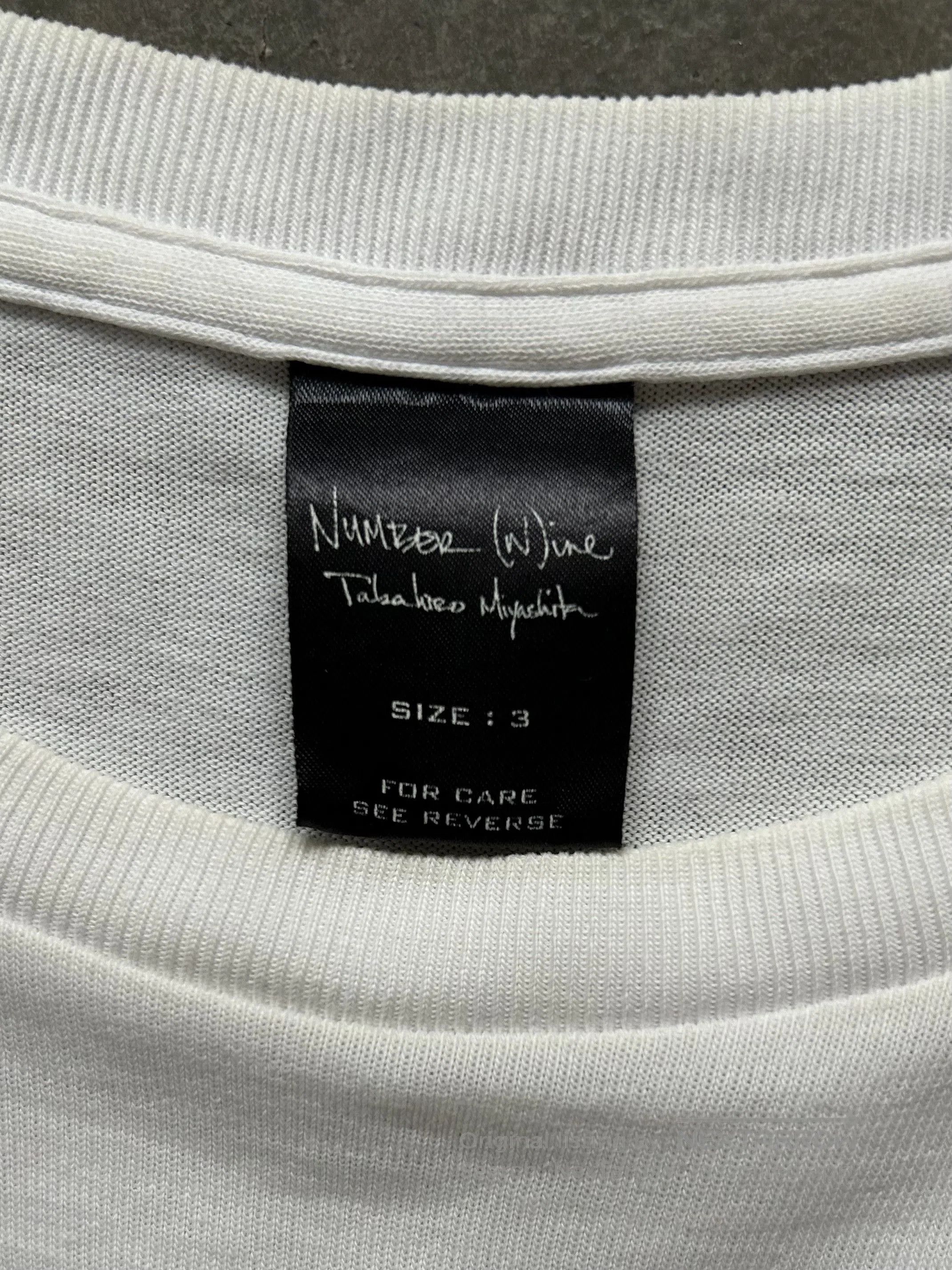 DEN IM by SIKI IM Number (N)ine 04SS Slogan T. Size US L / EU 52-54 / 3 - 6 Thumbnail