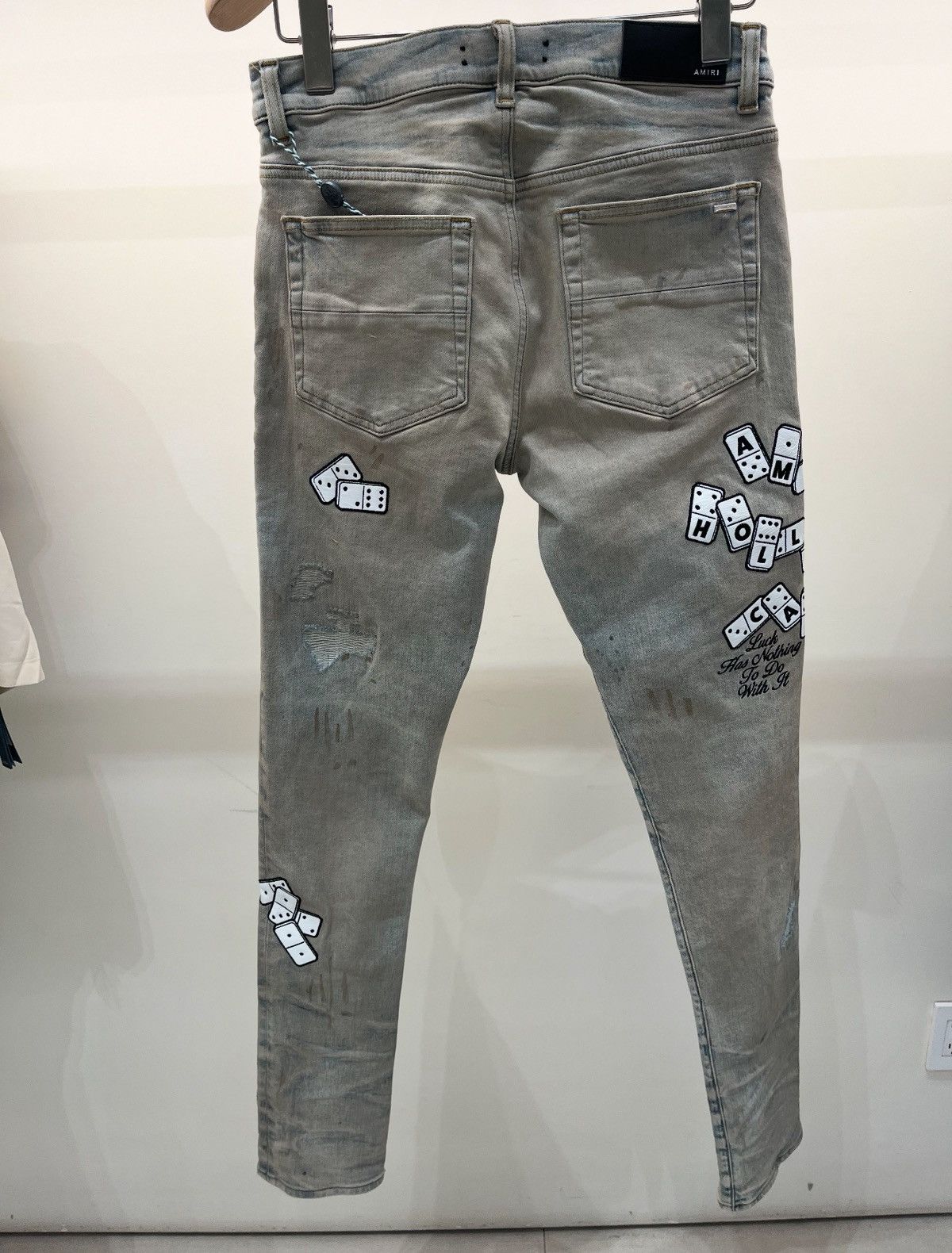 Amiri domino patch jeans 33