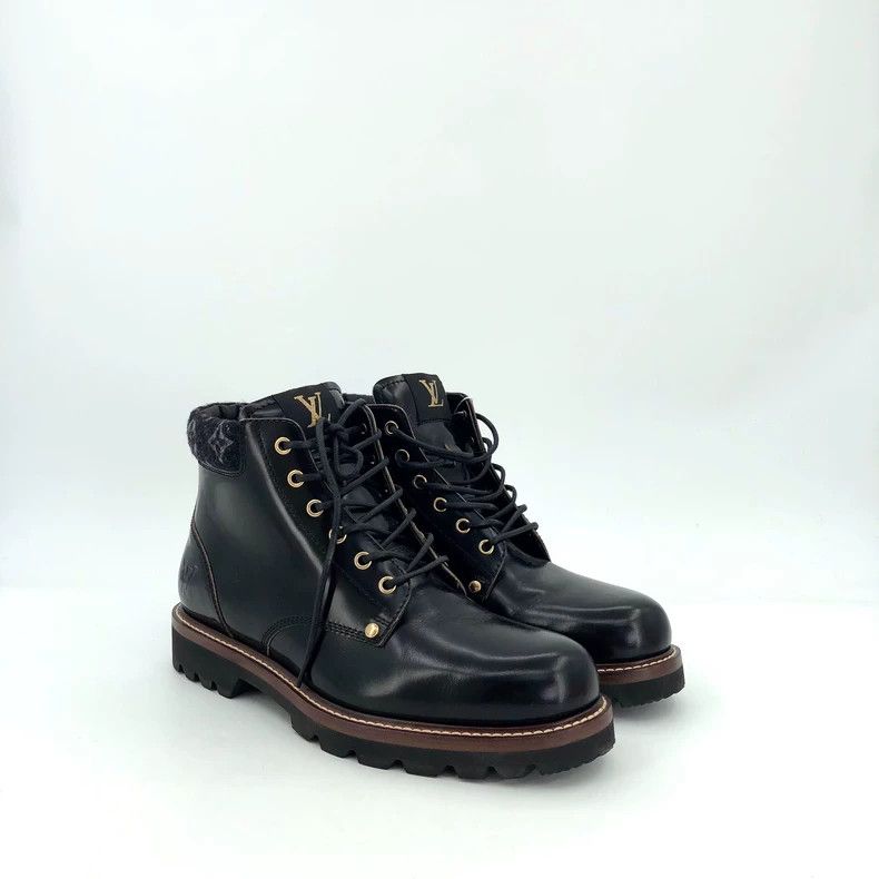 Louis Vuitton Black logo embossed leather lace-up Martin b