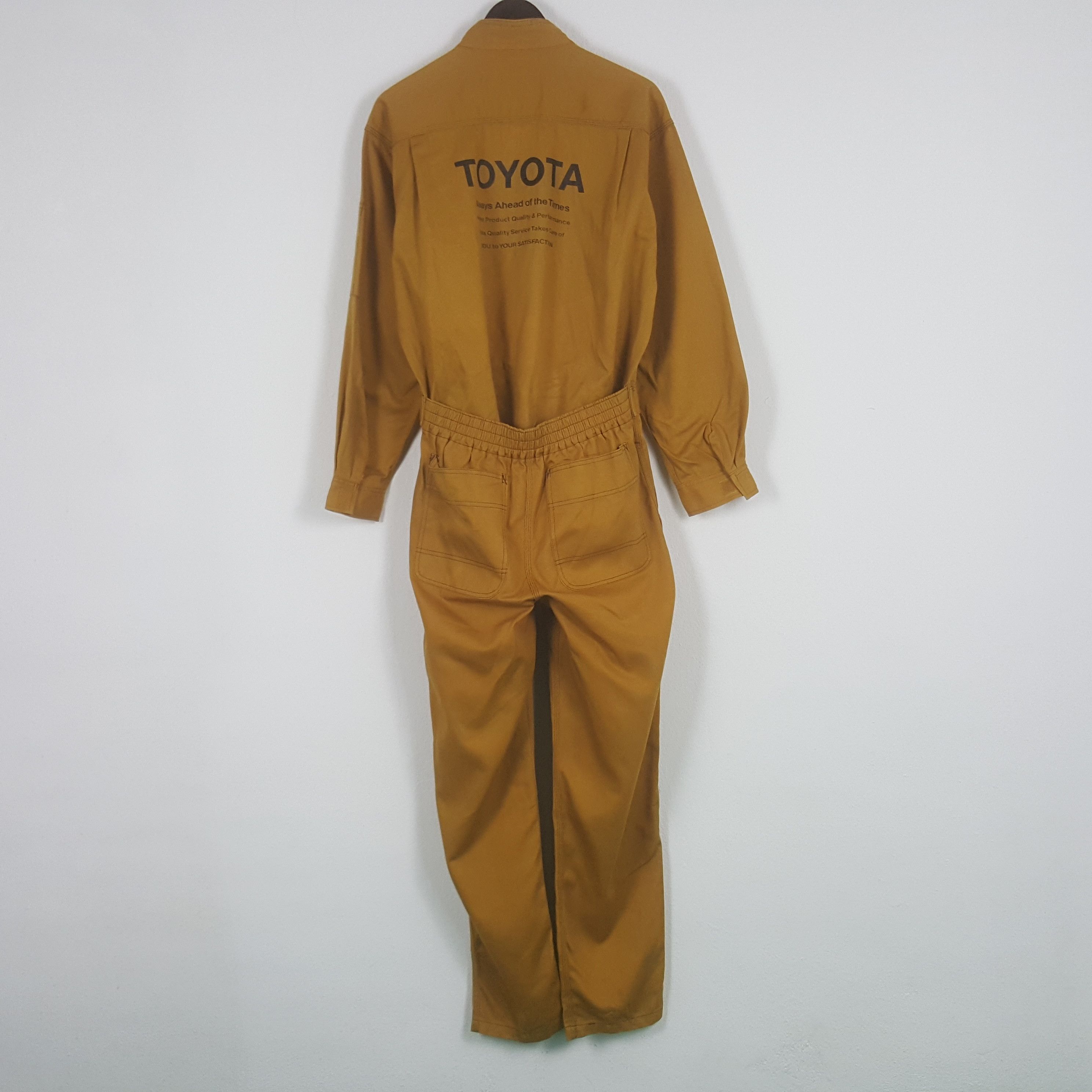 Image of Sports Specialties x Vintage Toyota Tecno Racing Jumpsuit Coverall Jacket in Brown (Size Small)