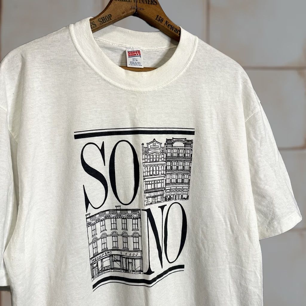 Soffe VINTAGE 1990s SoHo SoNo Graphic T White T Shirt Soffe Adult XL USA 50/50 Art Shirt Mens XL White Graphic 90s Art Size US XL / EU 56 / 4 - 1 Thumbnail