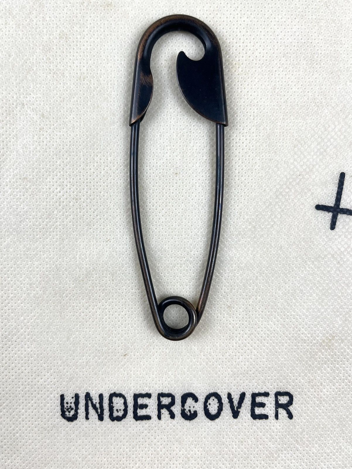 Undercover AW06 Undercover Oversized Safety Pin Guru Guru | Grailed
