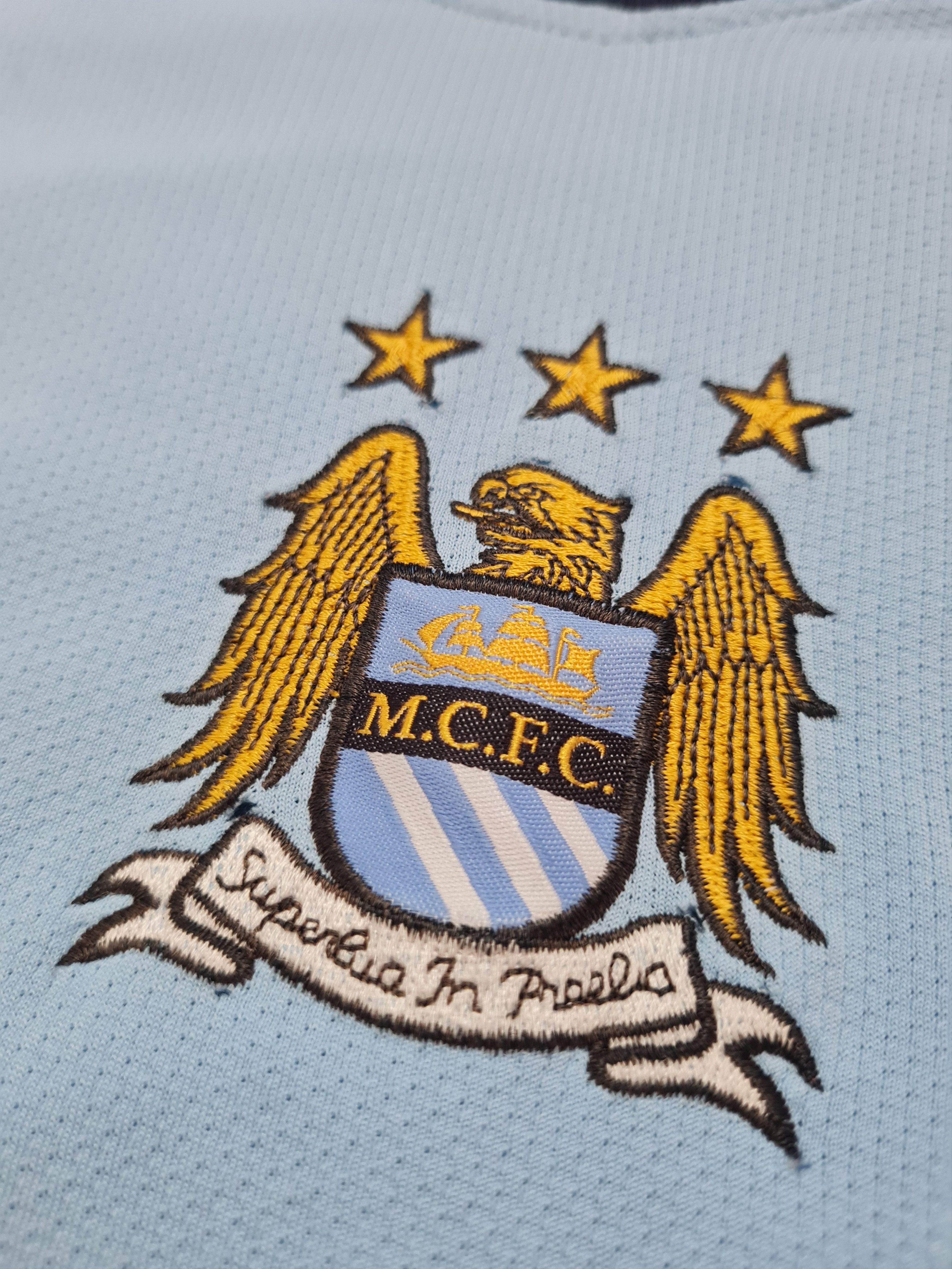 Le Coq Sportif Manchester City 08/09 #2 Richards Le Coq Sportif Thomas Cook Size US XL / EU 56 / 4 - 13 Thumbnail