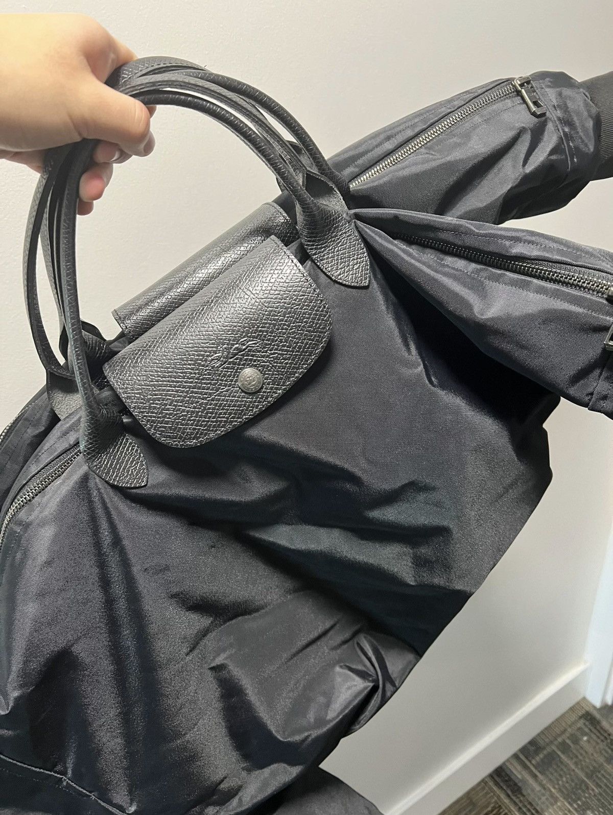 Longchamp Shayne Oliver bomber bag sleeves