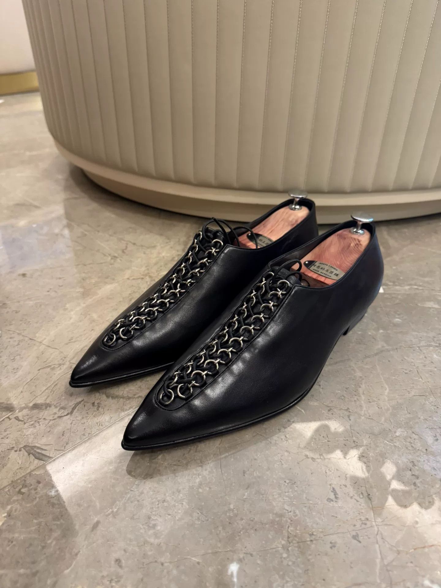 Saint Laurent Black Chelsea Boots with Chain Detail
