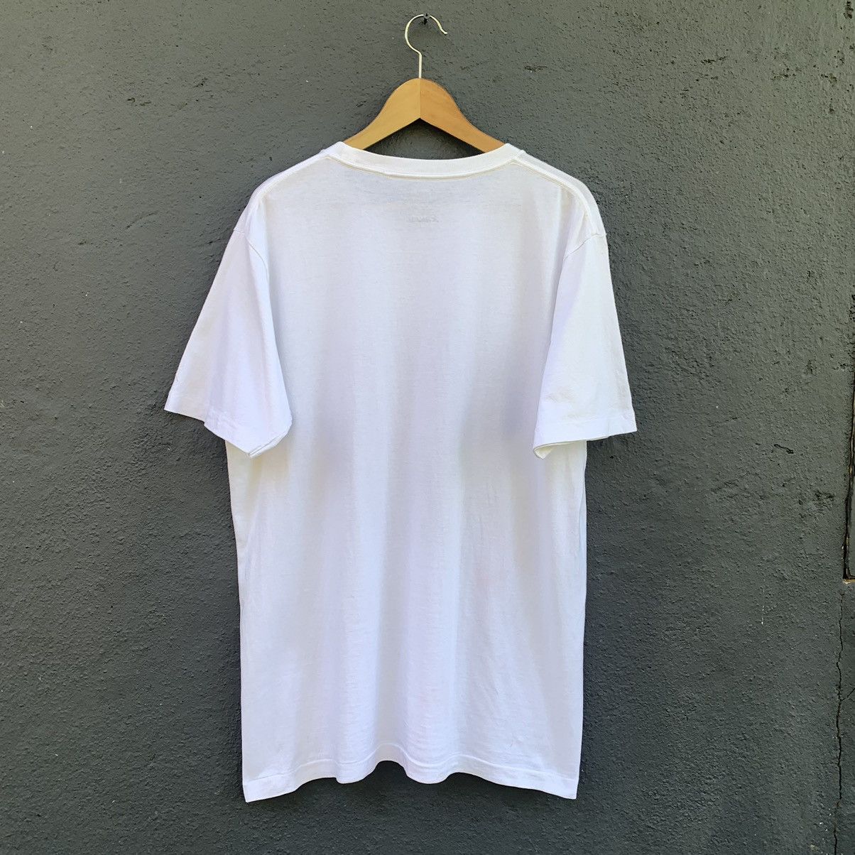 Kaws Kaws x uniqlo japanese brand tee Size US XL / EU 56 / 4 - 3 Thumbnail