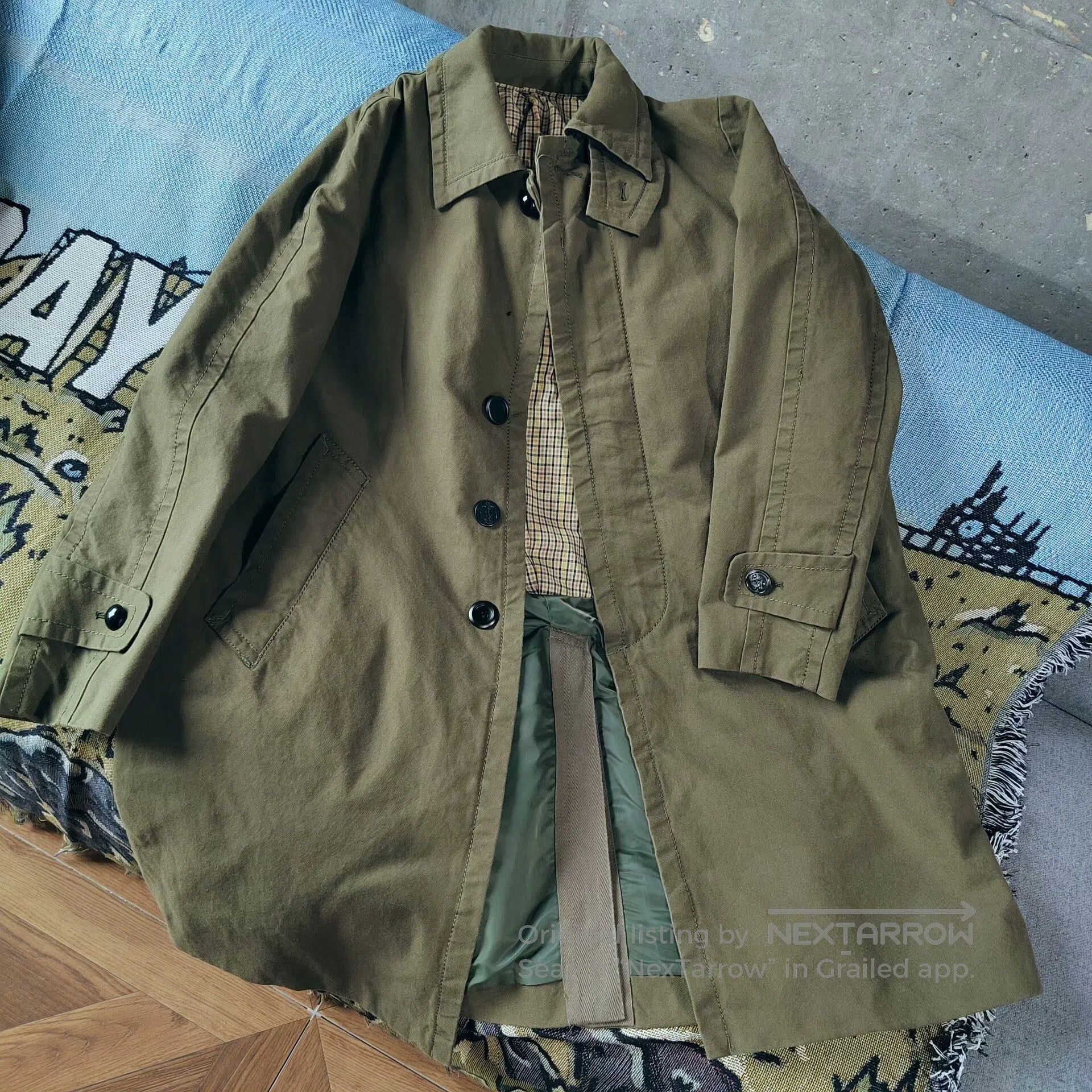 Sacai Olive Green Windbreaker Coat.