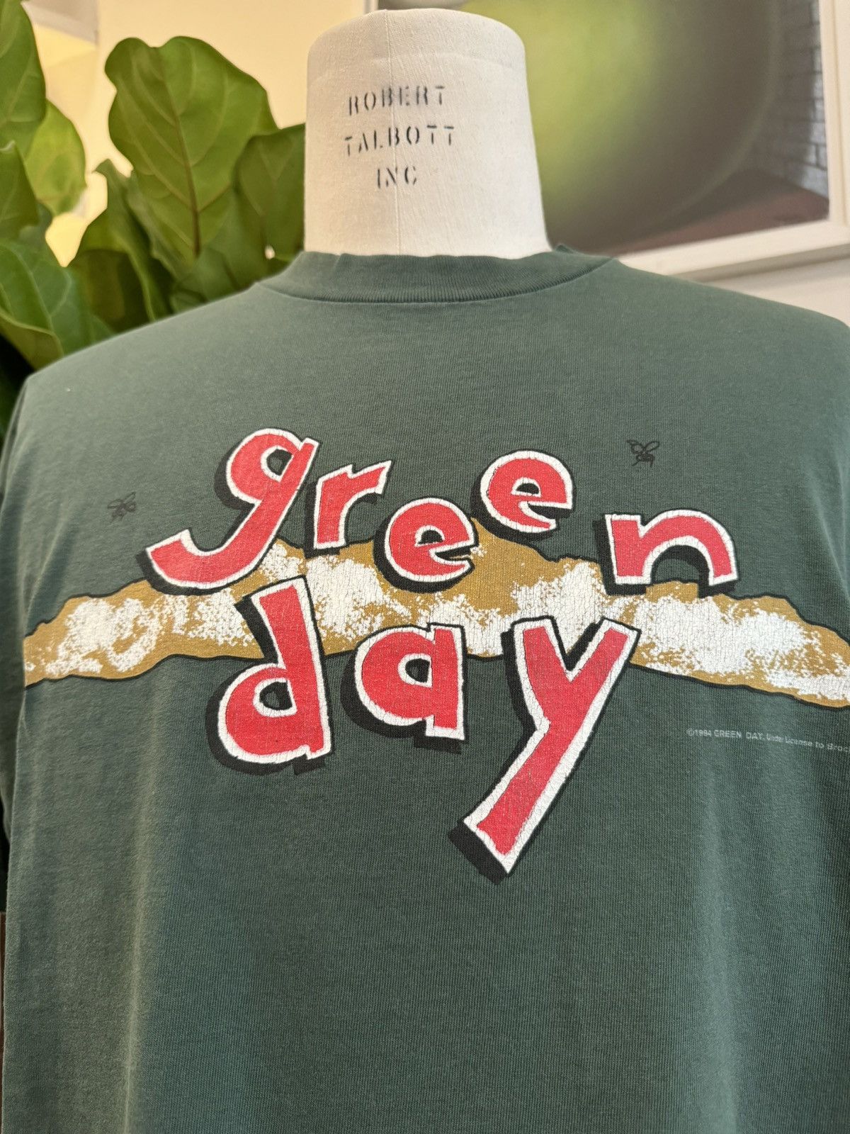 image of Band Tees x Brockum Vintage 1994 Green Day Dookie Promo Tee Brockum Faded in Faded Green (Size Larg