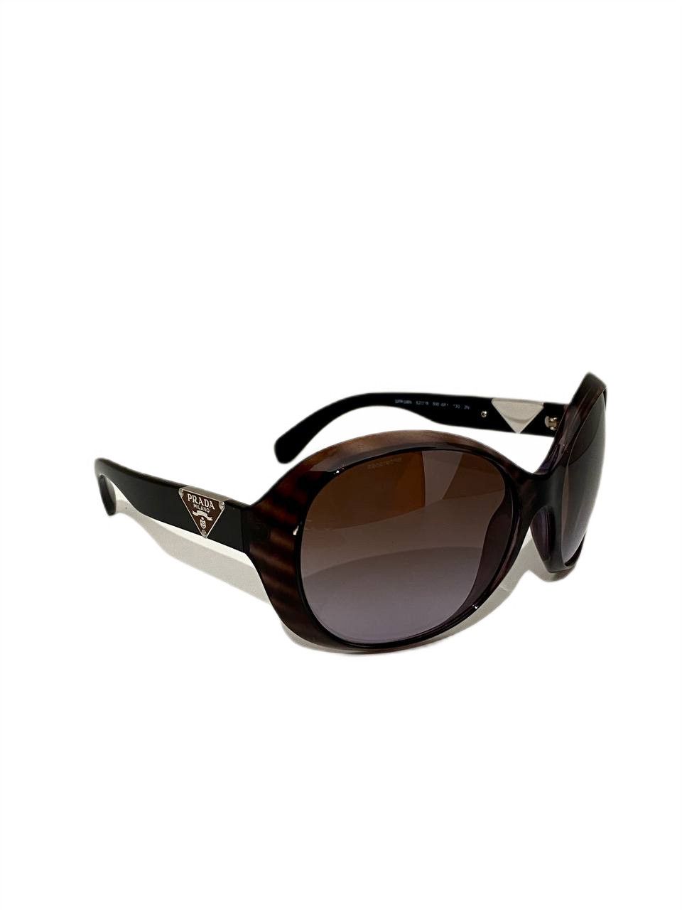 Prada Prada Milano Triangle Logo Oval Brown Oversized Sunglasses Size ONE SIZE - 1 Thumbnail