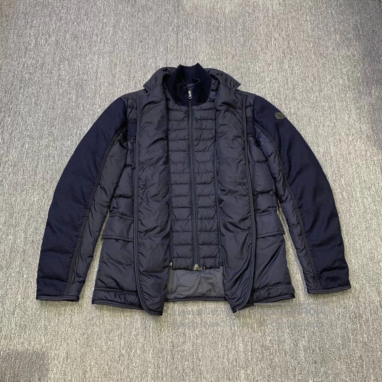 moncler deep blue down jacket with detachable design.