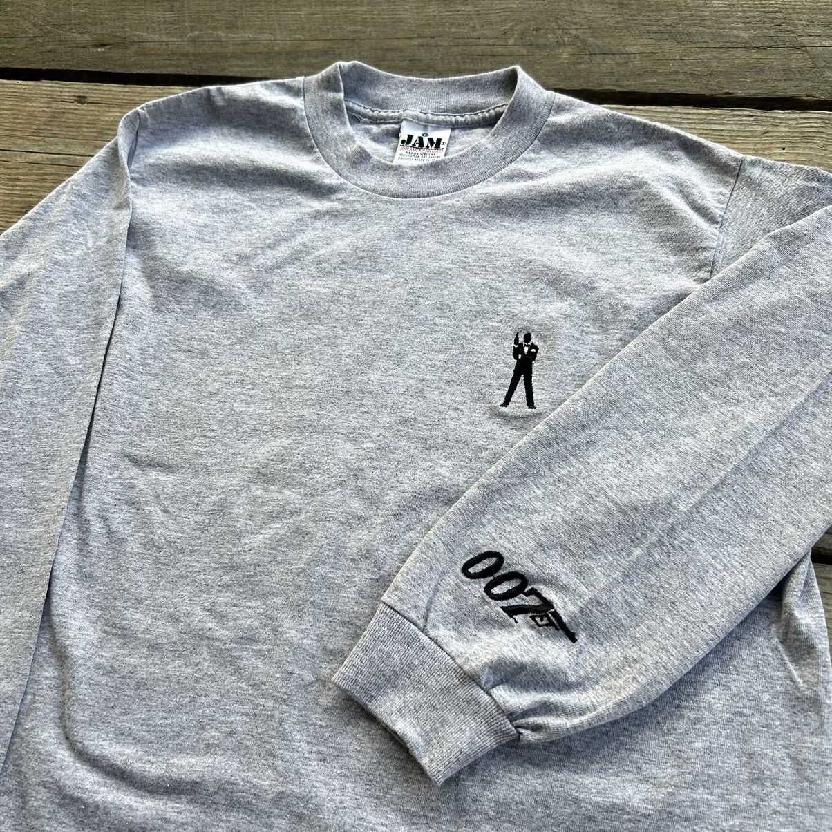 Vintage Vintage 90s 007 Tomorrow Never Dies Long Sleeve T Shirt Size US L / EU 52-54 / 3 - 1 Thumbnail