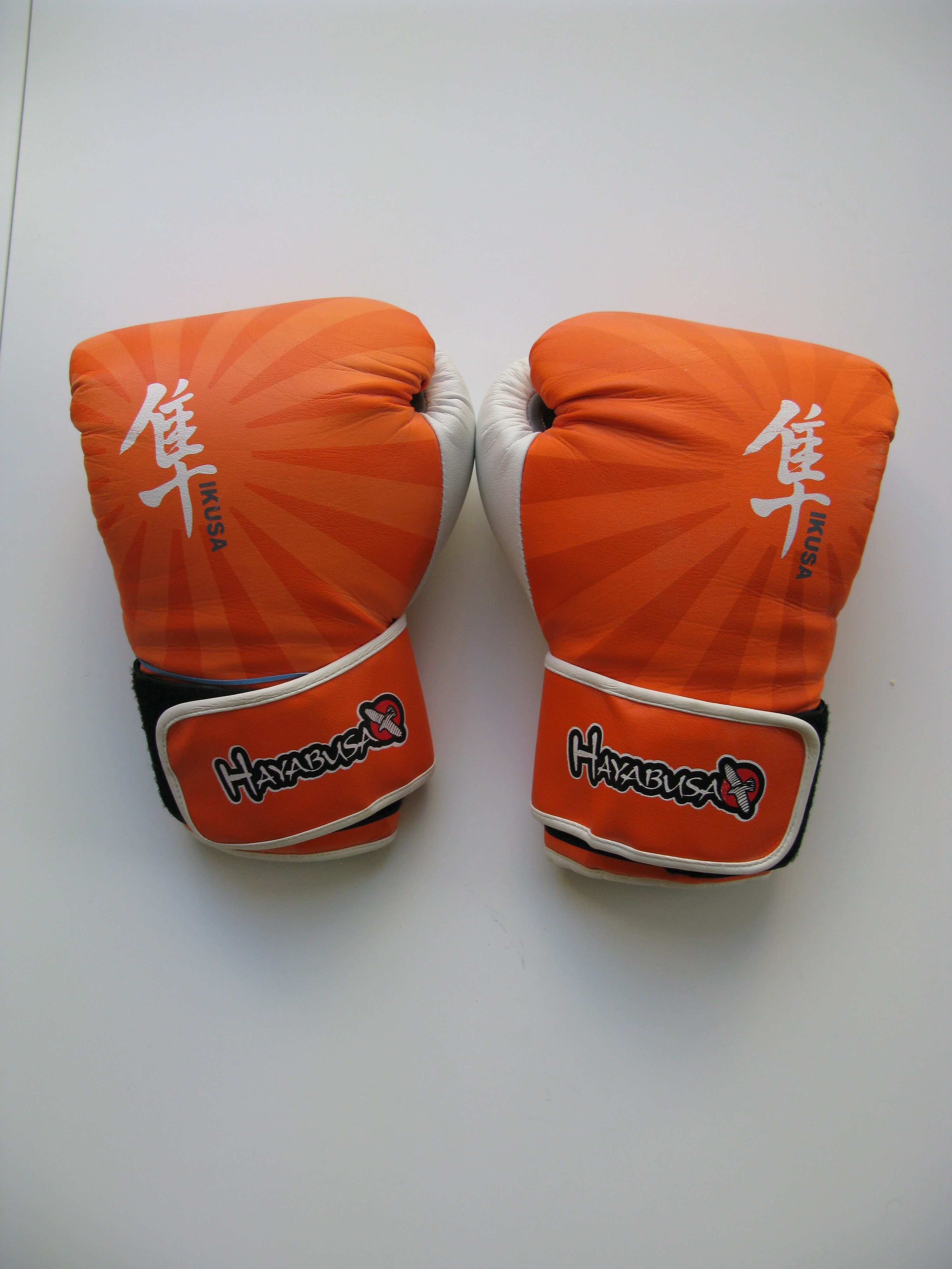 image of Hayabusa Ikusa 16 Oz Boxing Gloves, Orange & White, Men's