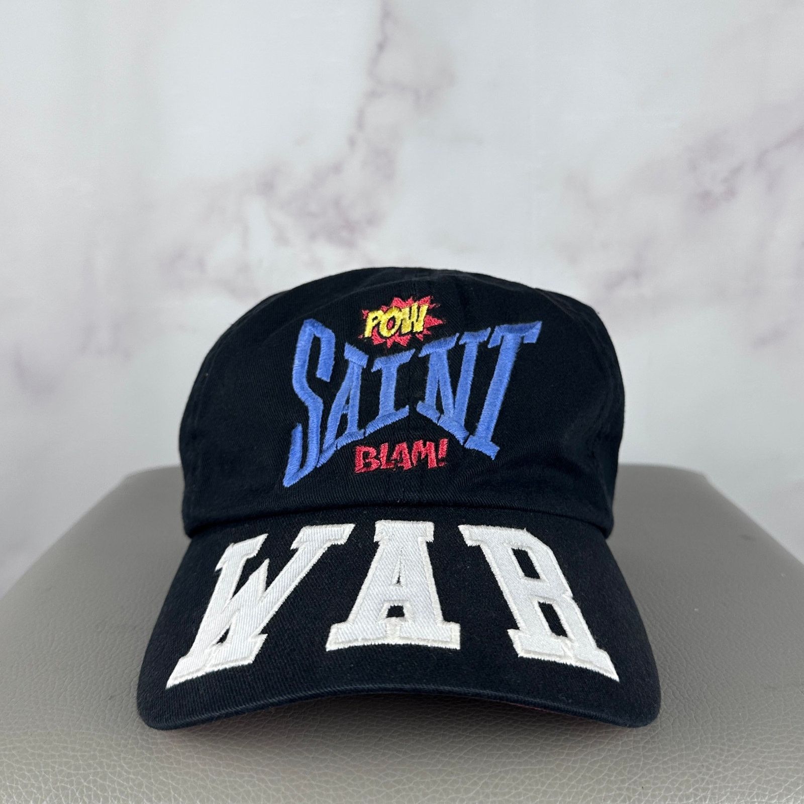 Saint Michael A/W21 Black ‘WAR’ Comic Hat Size ONE SIZE - 1 Thumbnail