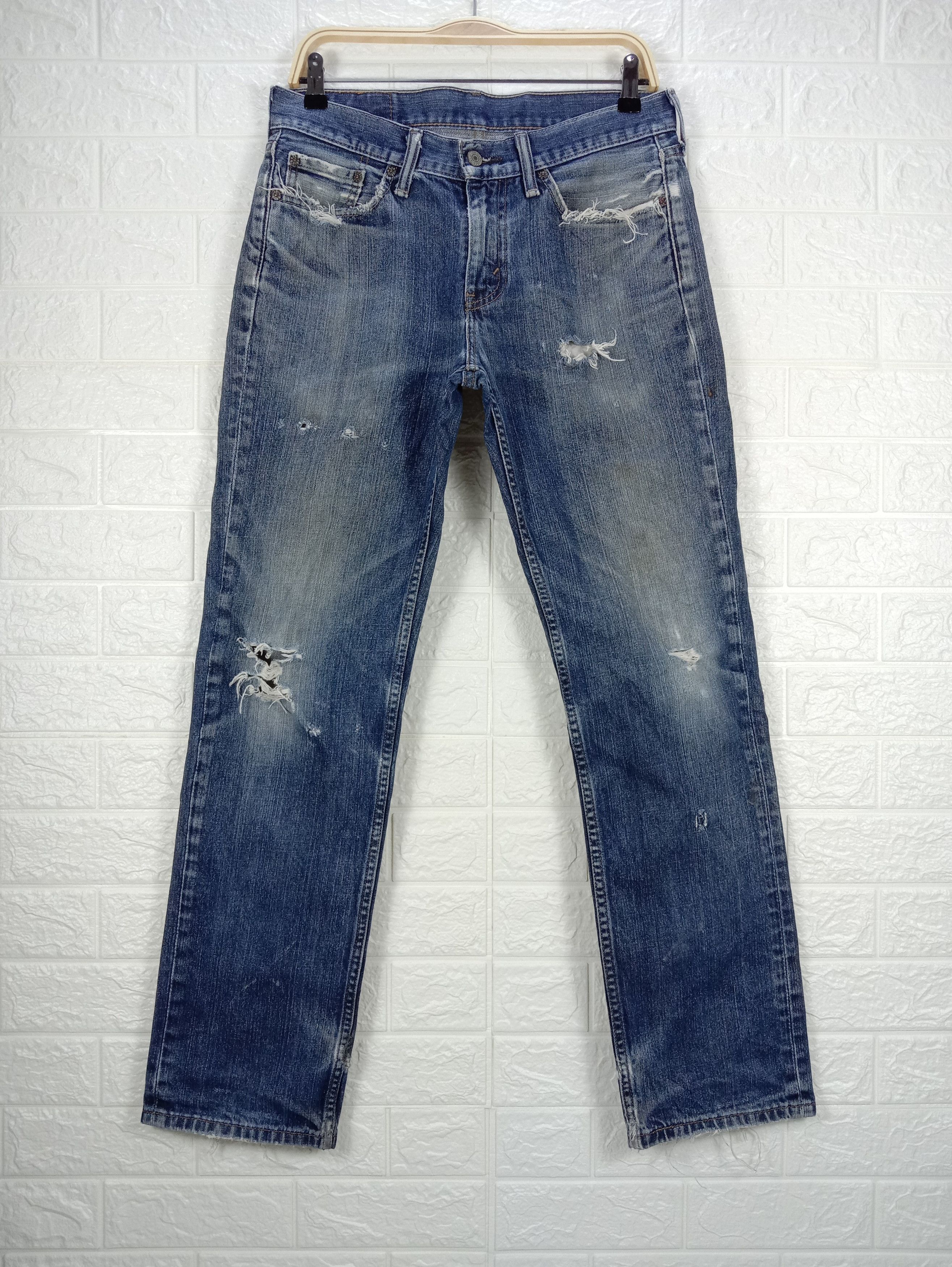 image of Distressed Denim x Levis Vintage Levi's 514 Jeans Earth Tone Ripped Denim in Blue, Men's (Size 30)