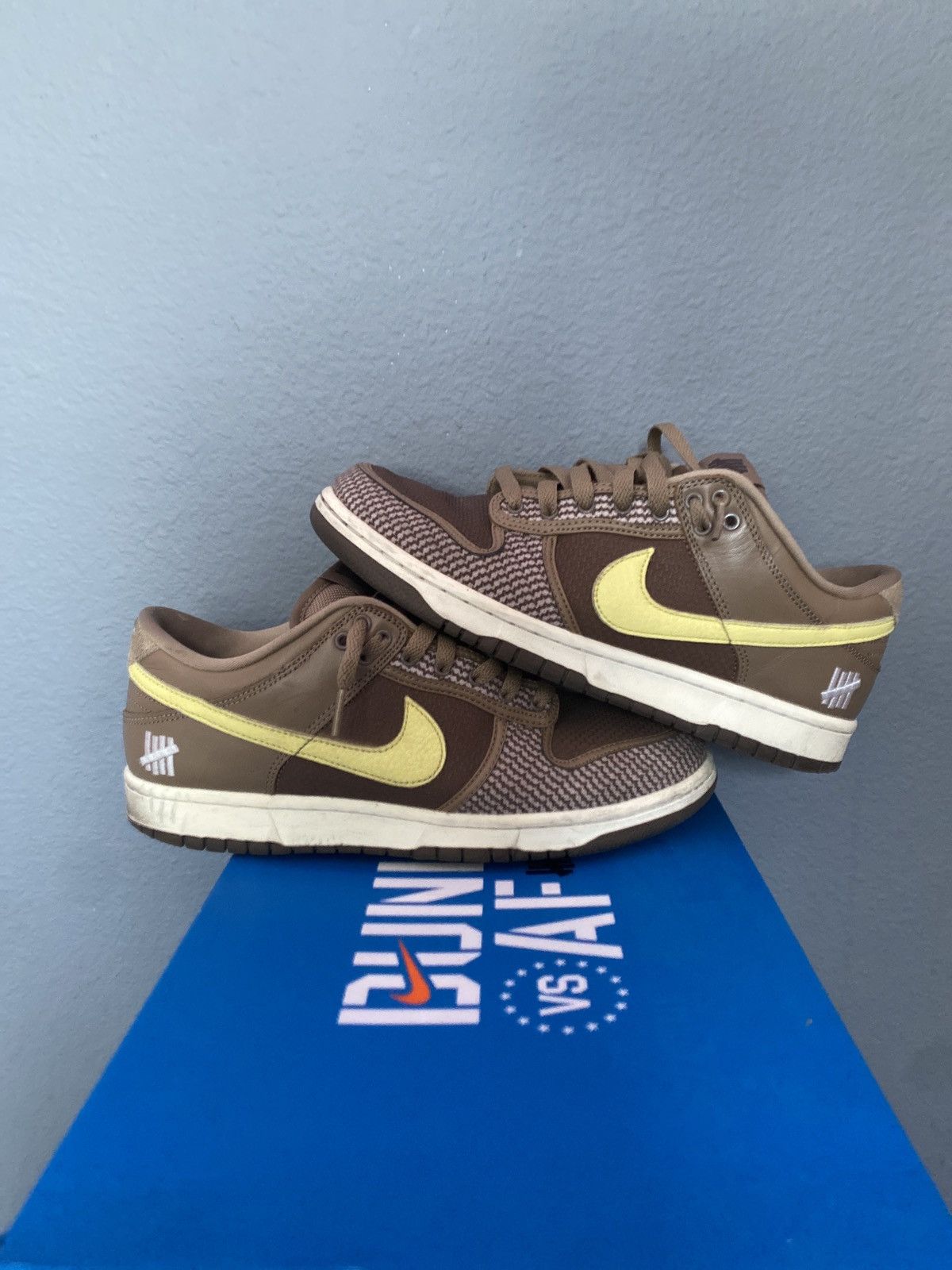 image of Nike Dunk Low Sp / Undefeated Shoes in Brown, Men's (Size 8.5)