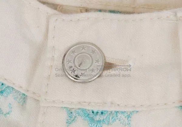 white vintage embroidered flower pants.