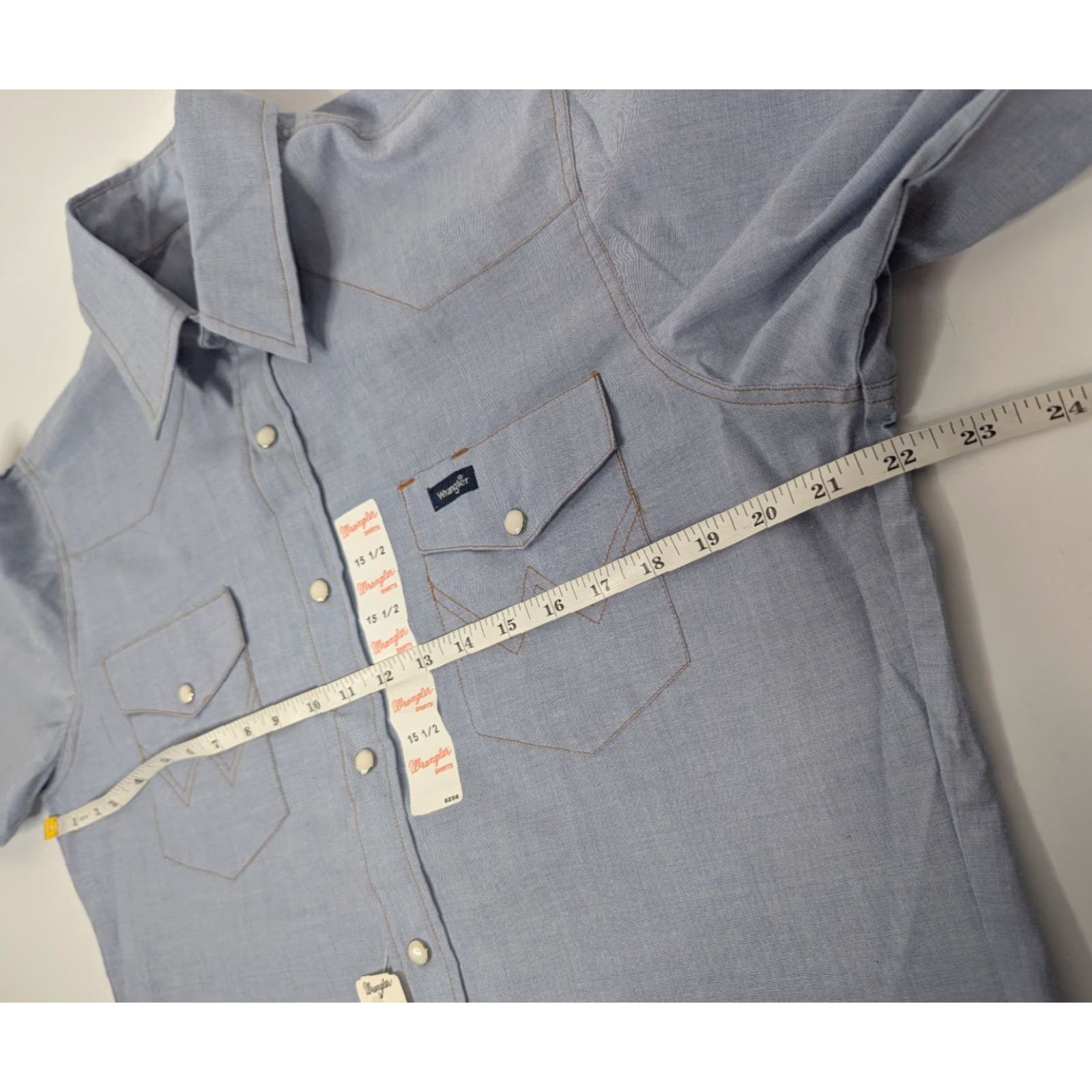 Wrangler VINTAGE Wrangler Light Blue Chambray Pearl Snap Western SS Shirt Men's XL Blue Cowboy Cut Work 90s Wrangler Cowboy Cut Shirt Size US XL / EU 56 / 4 - 5 Thumbnail