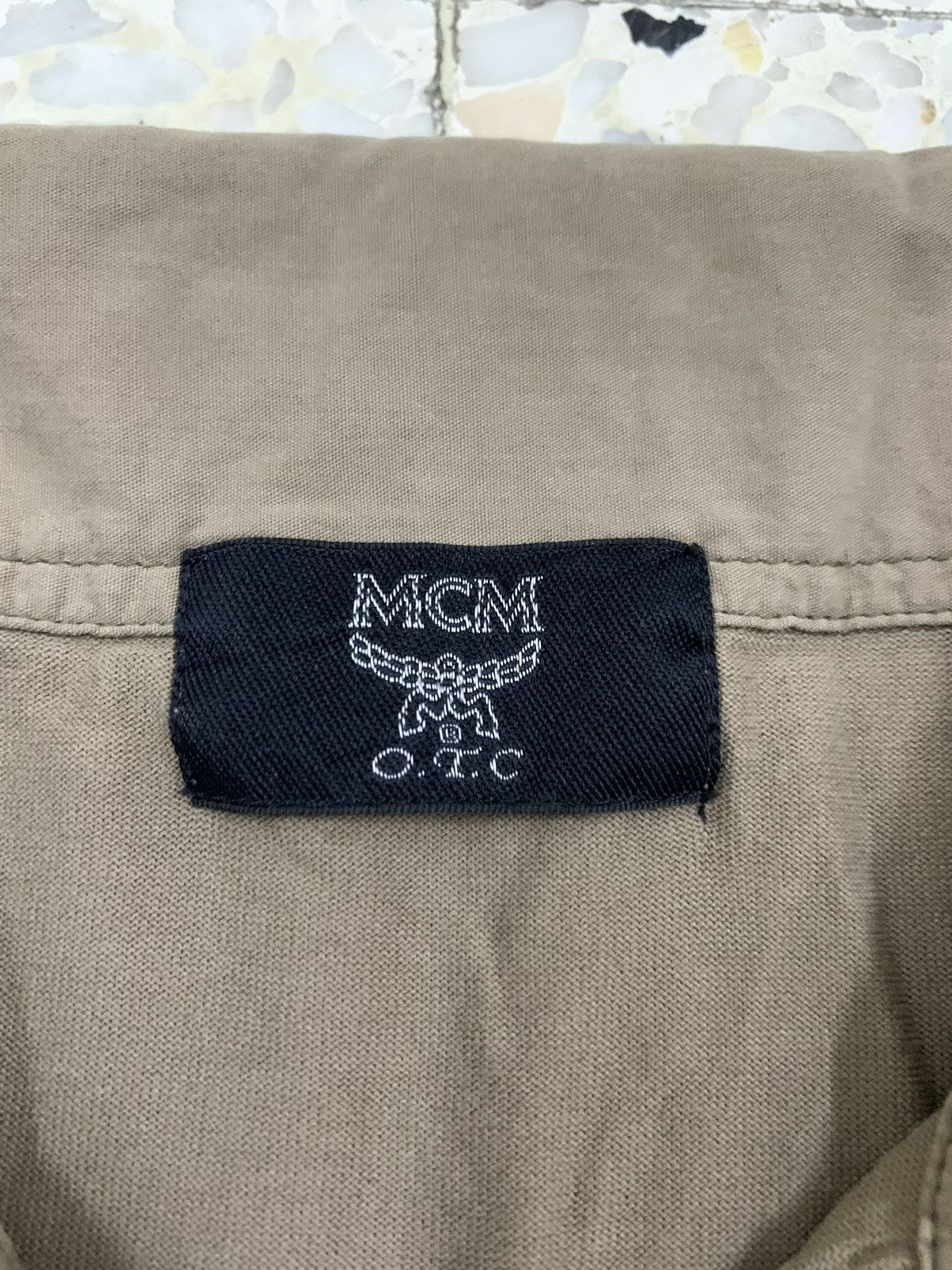 Japanese Brand × MCM MCM O.T.C POLO TEE Size US L / EU 52-54 / 3 - 4 Thumbnail