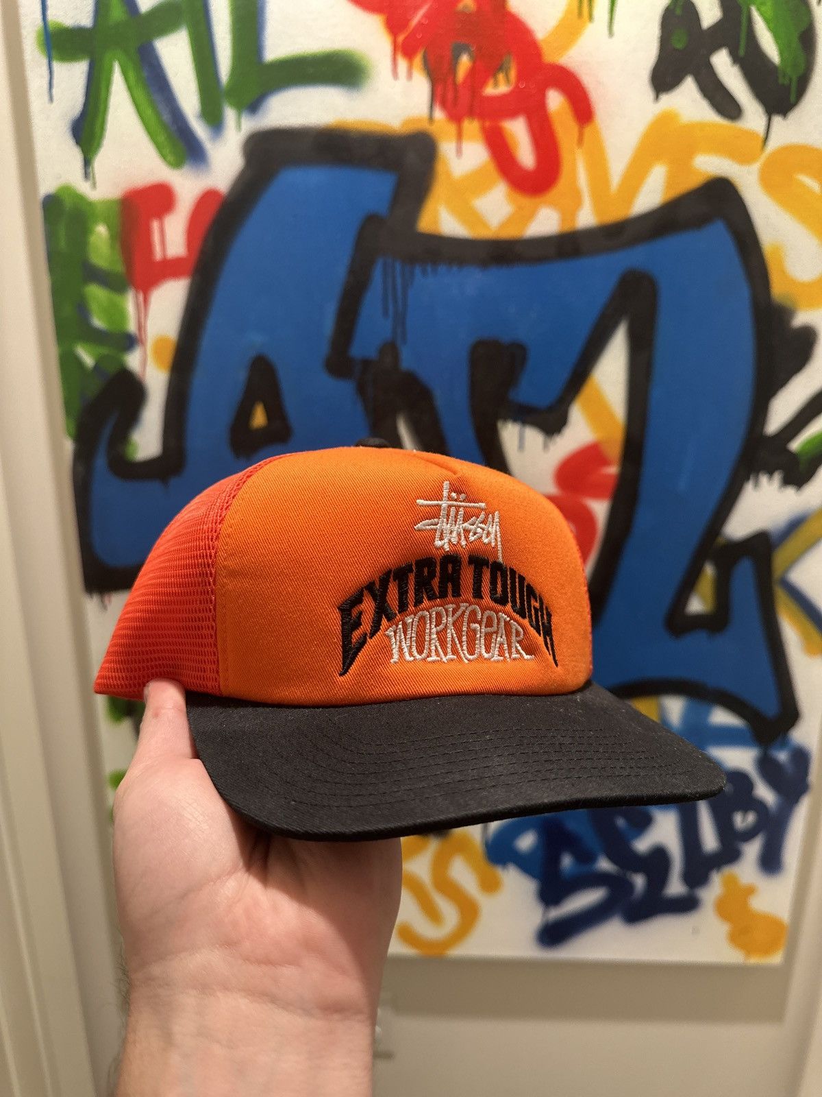 Stussy Orange stussy trucker hat | Grailed