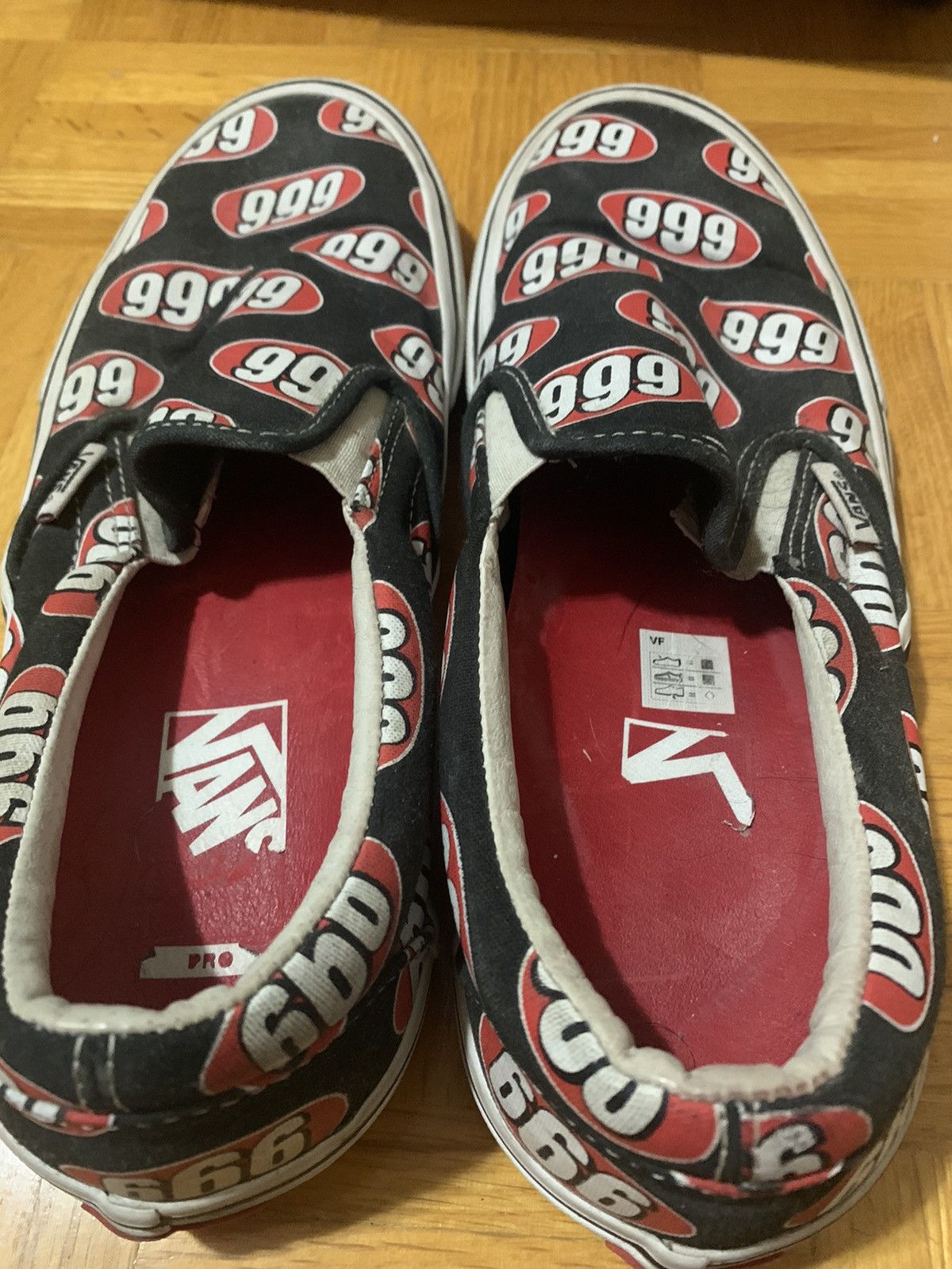 Supreme Vans supreme x vans slip ons SUPREME 666 black size 9.5 US Grailed