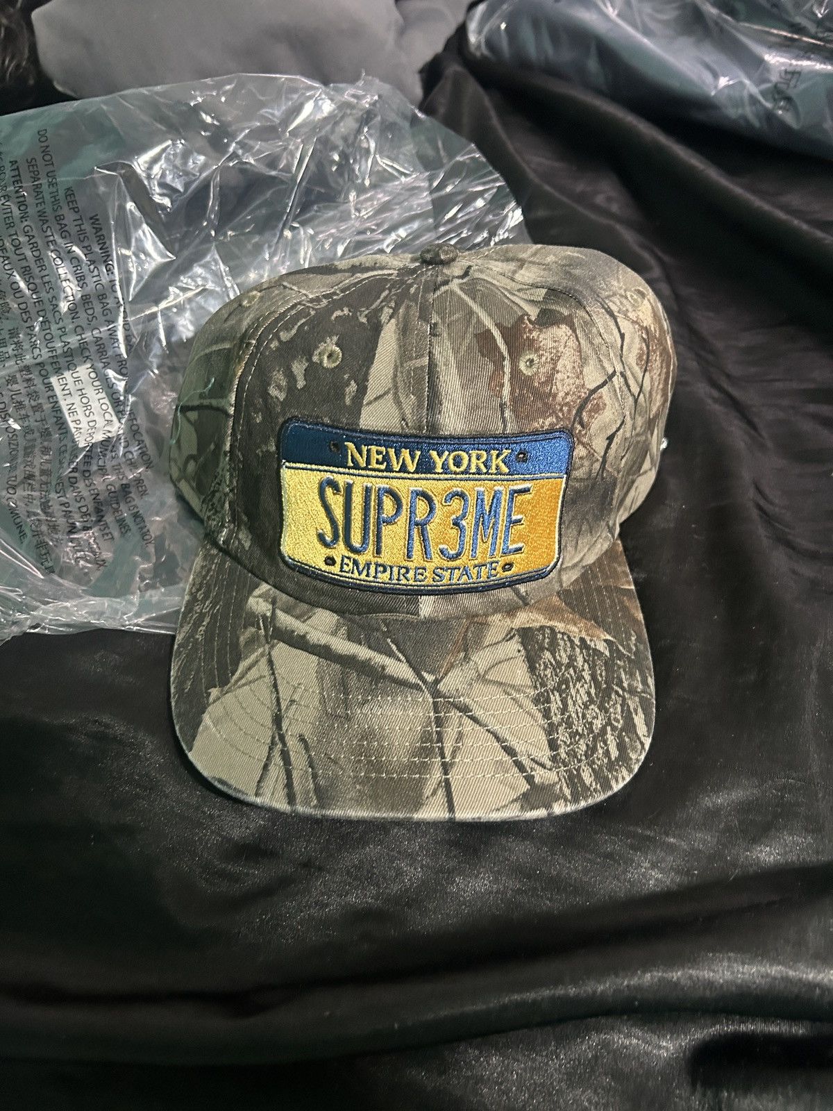 Supreme License Plate 6-Panel (SS25) - $48