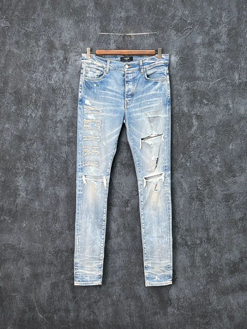 Amiri Amiri Embroidered logo distressed denim pants Size US 33 - 1 Thumbnail