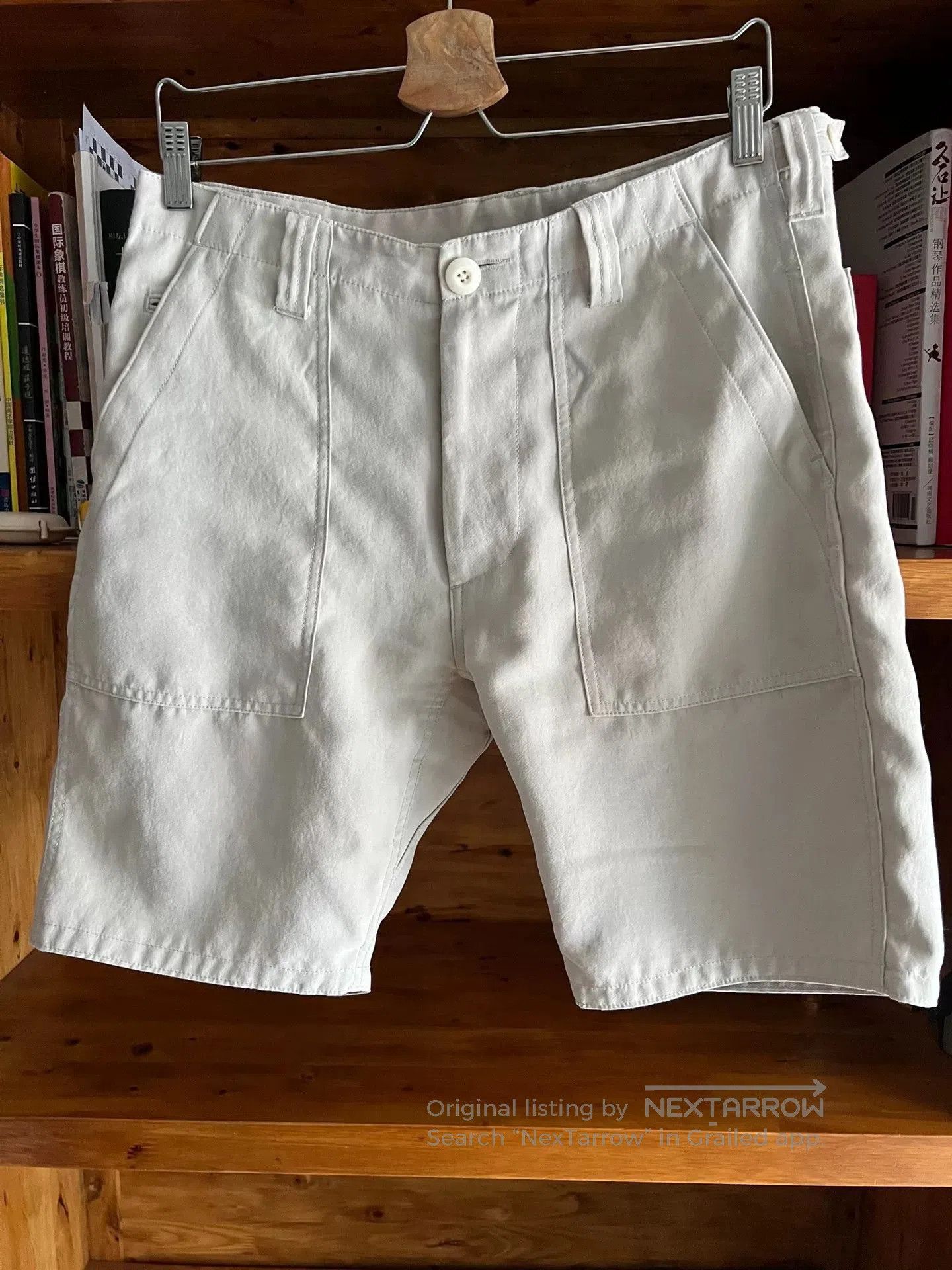 breathable cream work shorts with details.