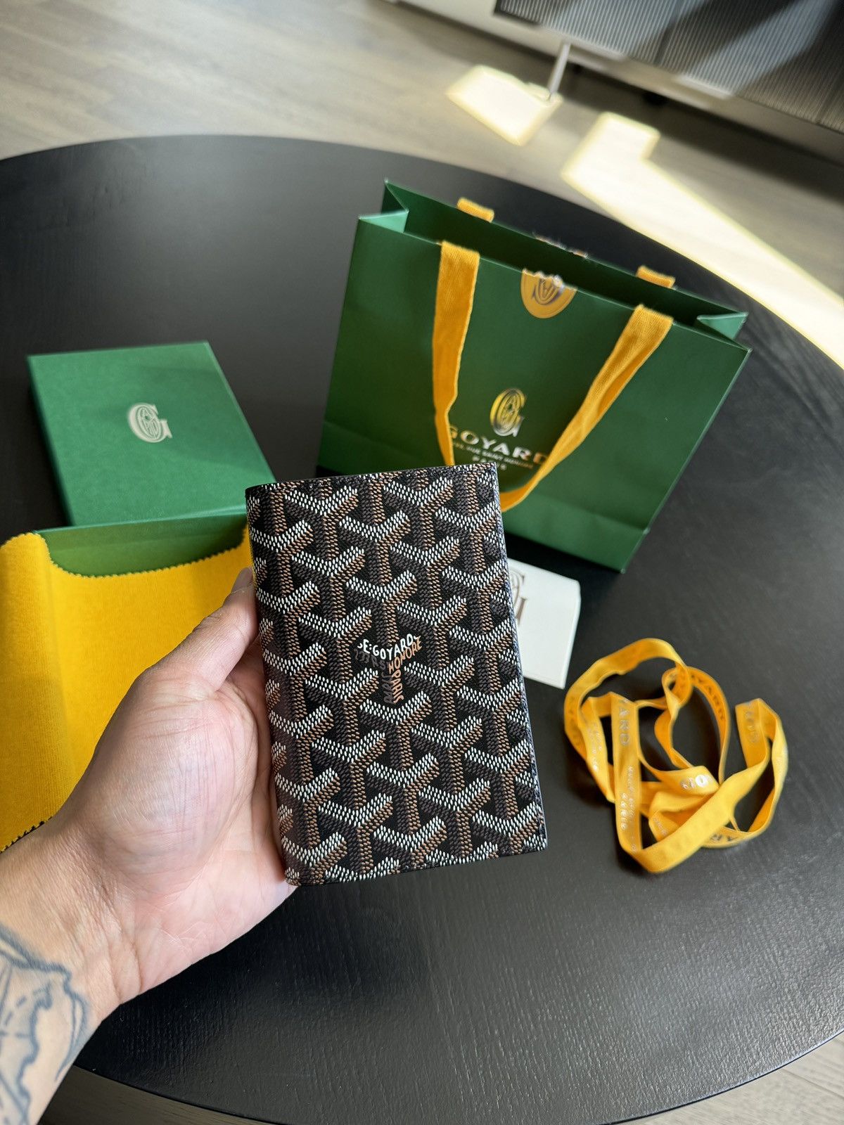 image of Goyard Passport Holder in Black, Men's