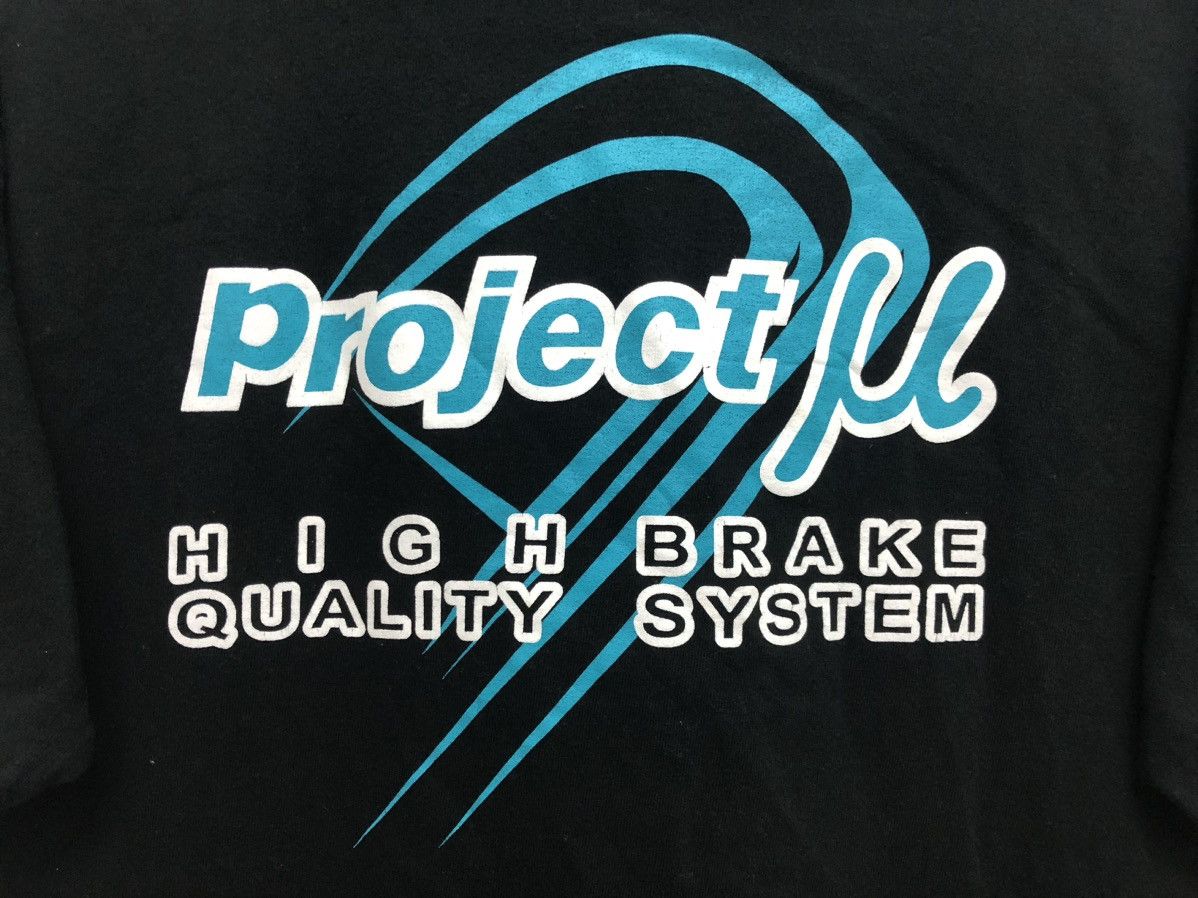 Sports Specialties × Vintage RARE 🔥 PROJECT MU RACING PAD PROMO TEE JDM STYLE RARE Size US L / EU 52-54 / 3 - 9 Thumbnail