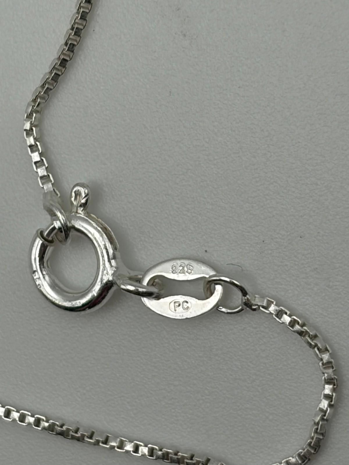 The Unbranded Brand Timeless Sterling Silver Cross Necklace with Green Stone Size ONE SIZE - 4 Thumbnail