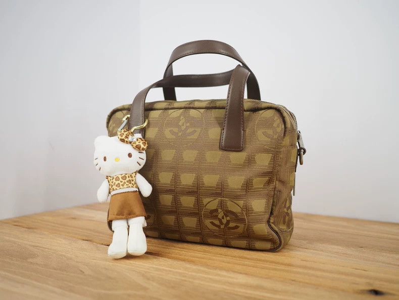 Chanel ChanelVintage brown nylon handbag 2503-Nextarrow Size ONE SIZE - 1 Thumbnail