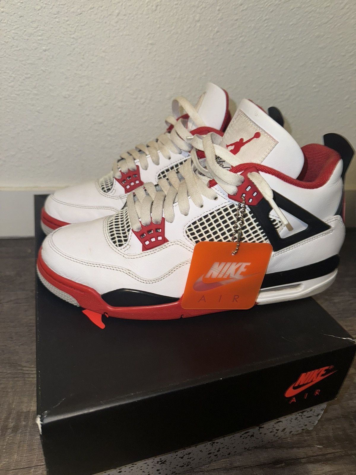 image of Jordan Nike Jordan 4 Fire Red Shoes in White, Men's (Size 9)