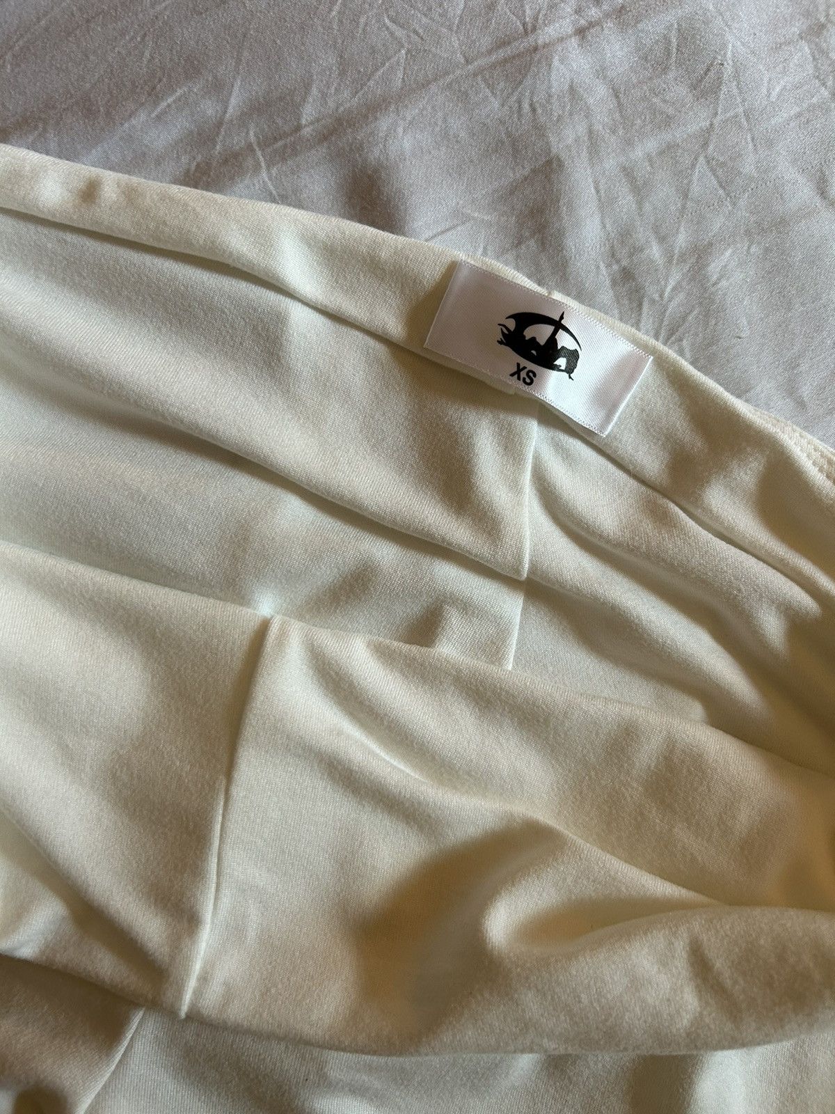 Cozy Worldwide Sculpted White Cyber Cut Out Pants